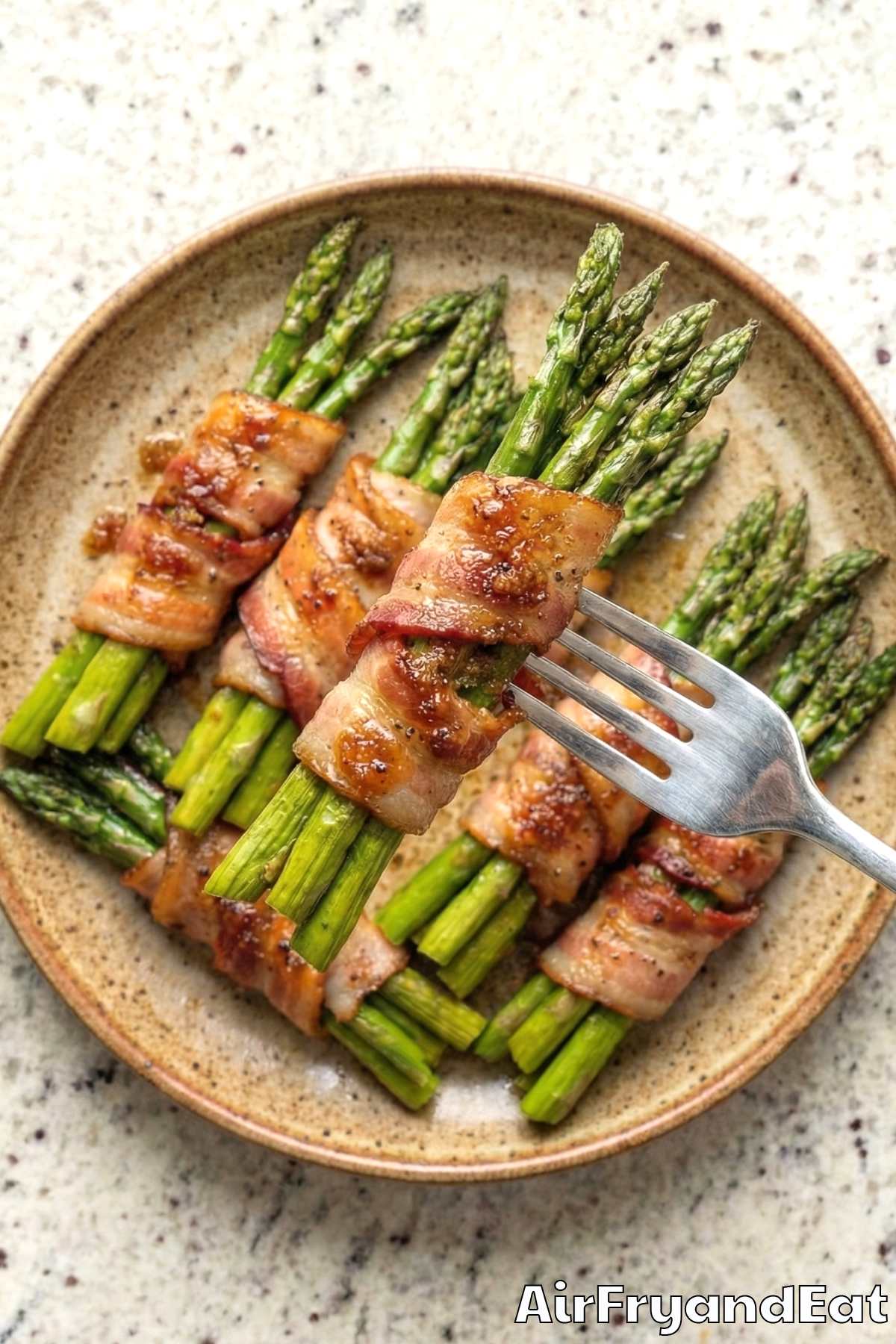 Juicy air fryer bacon wrapped asparagus