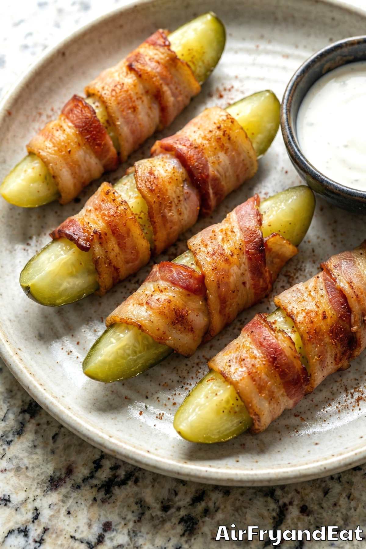 Perfectly crisp bacon wrapped pickle spears