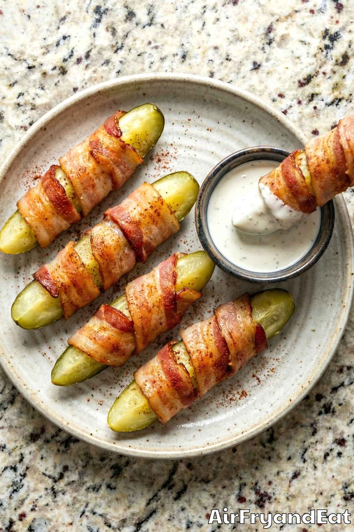 Crunchy air fryer bacon wrapped pickles close-up