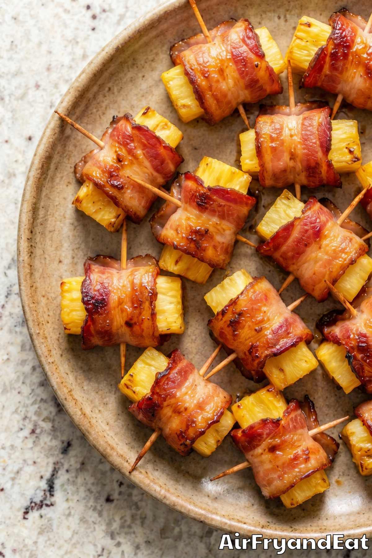 Golden air fryer bacon wrapped pineapple