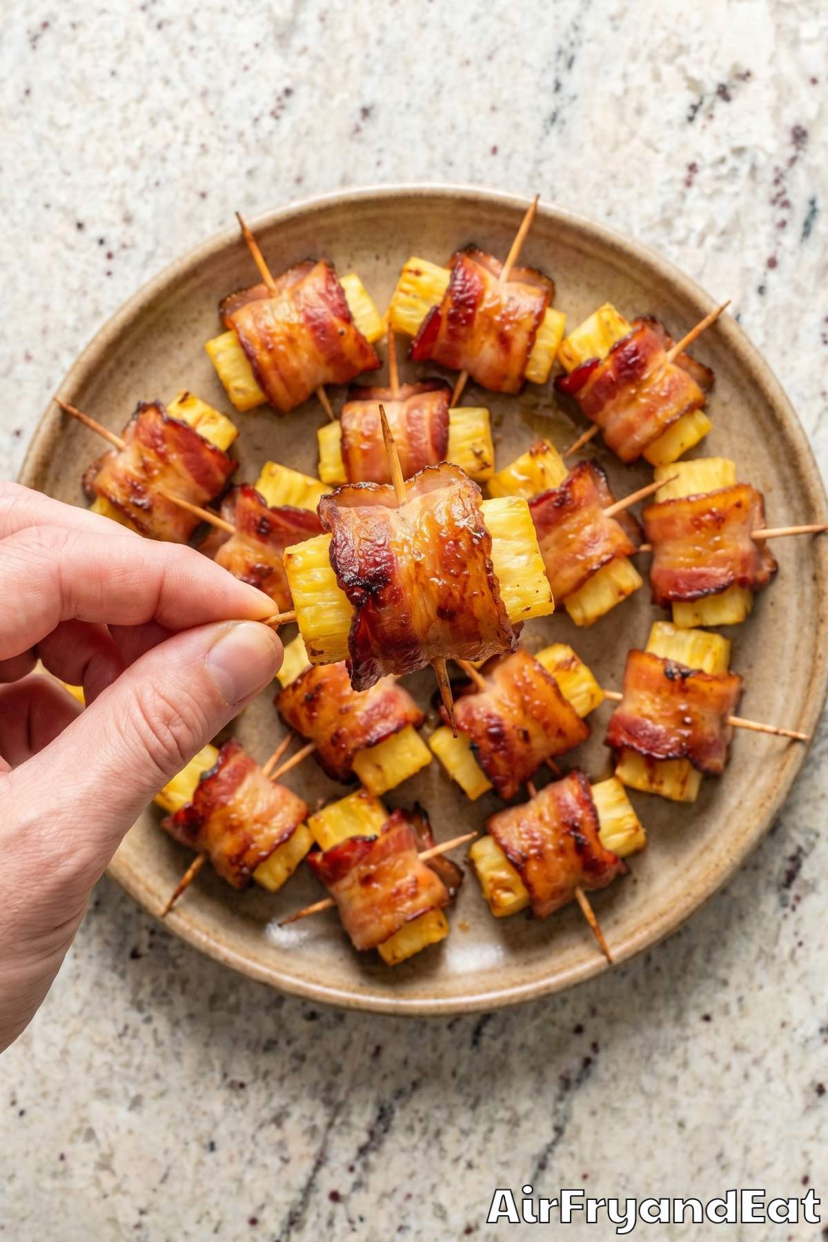 Caramelized air fryer bacon wrapped pineapple
