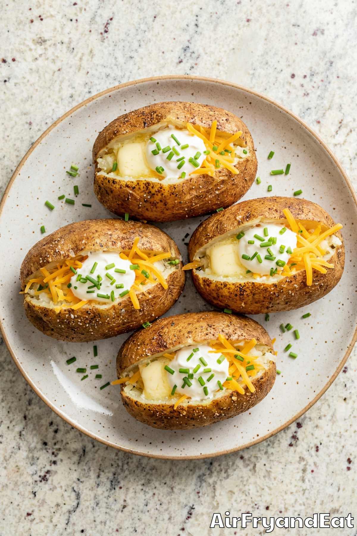 Comforting air fryer baked potatoes close up