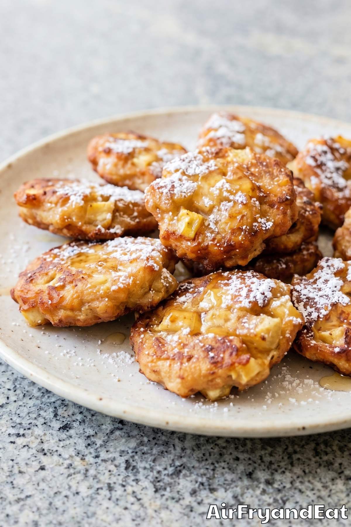 Fluffy air fryer banana fritters on parchment