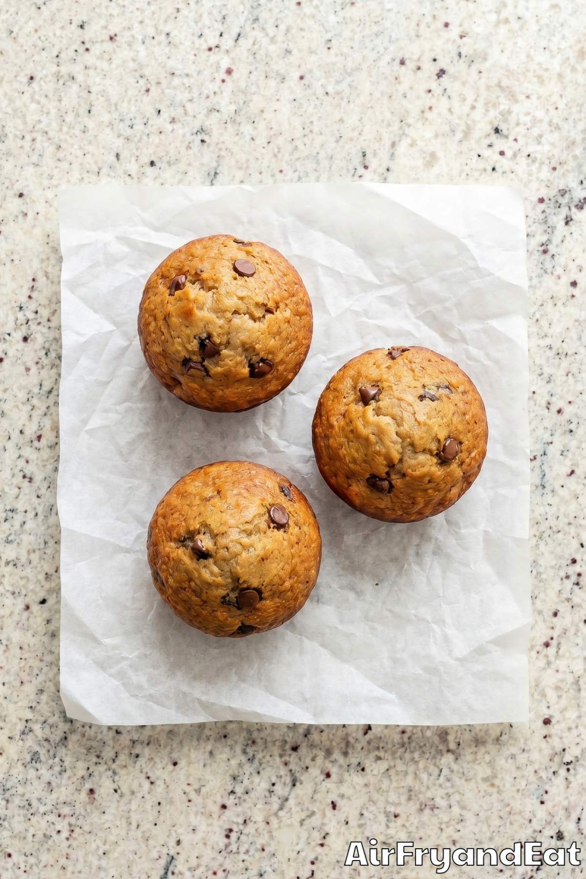 Soft air fryer banana muffins on a tray