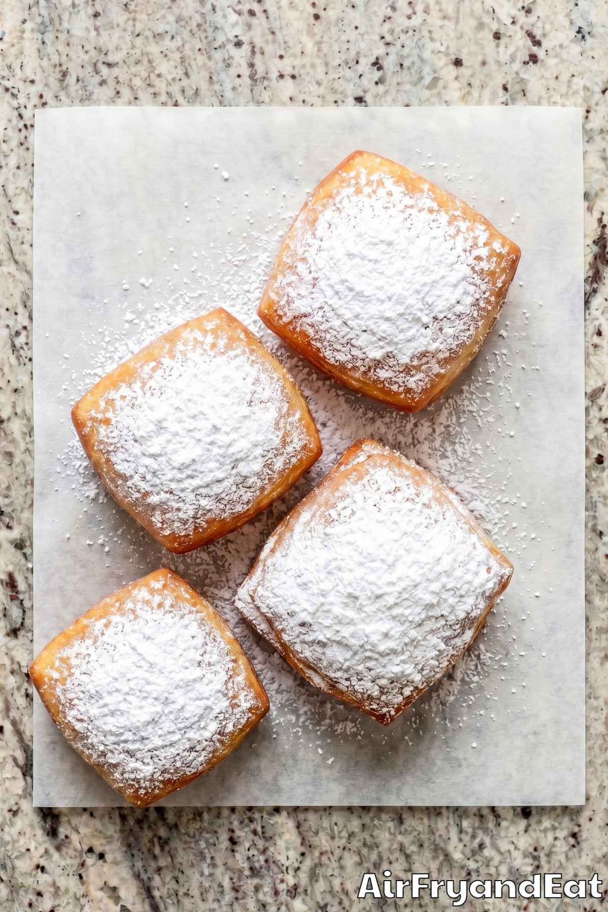 Fluffy air fryer beignets on a plate
