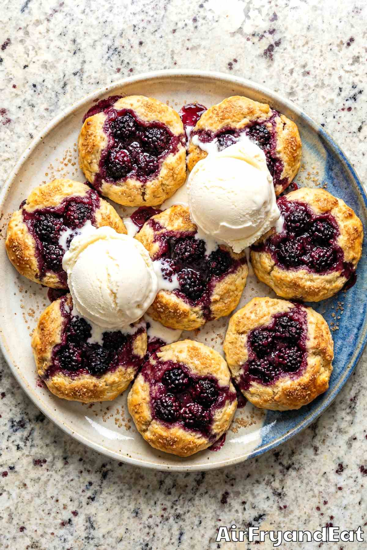 Air fryer blackberry cobbler biscuits on plate
