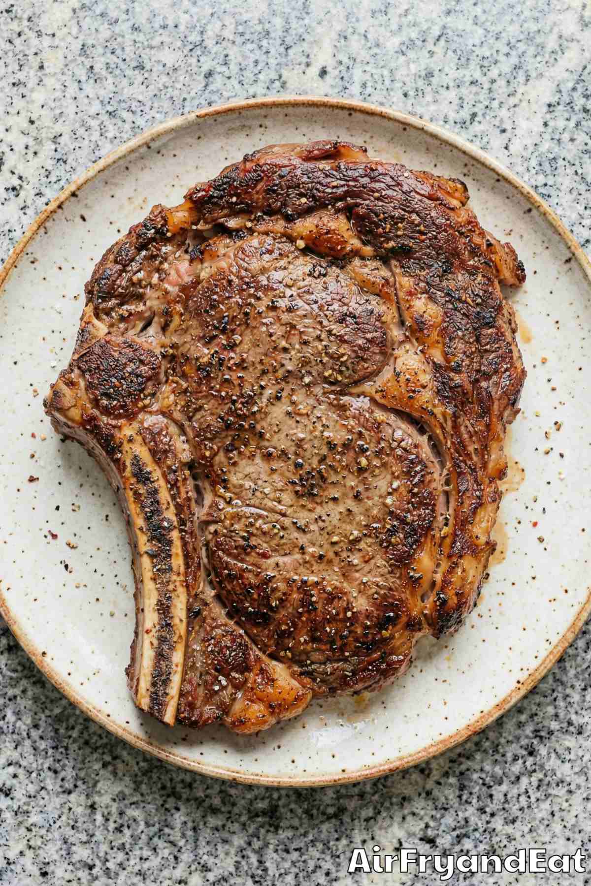 Mouthwatering air fryer bone-in ribeye steak