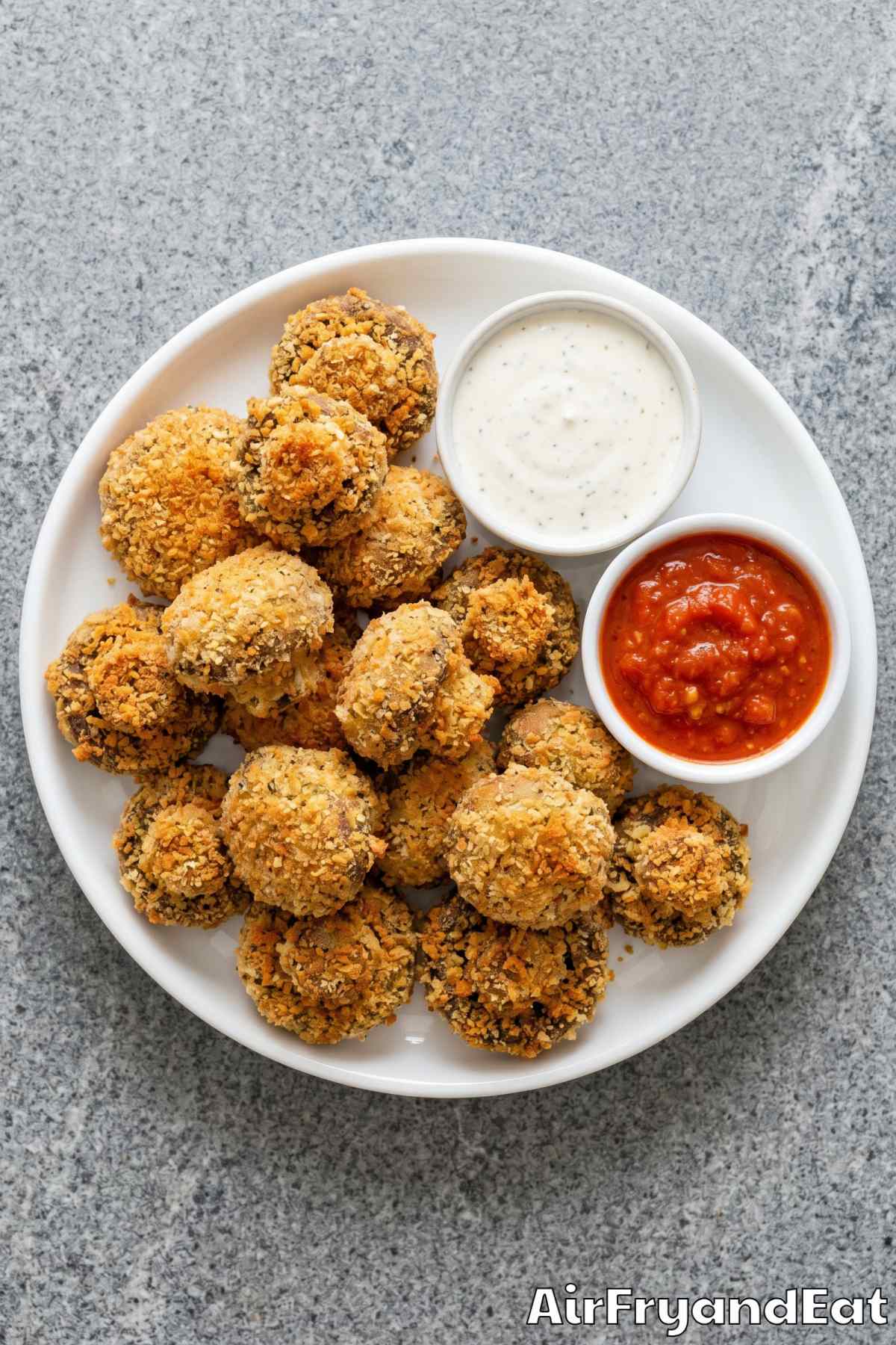 Homemade air fryer breaded mushrooms on platter