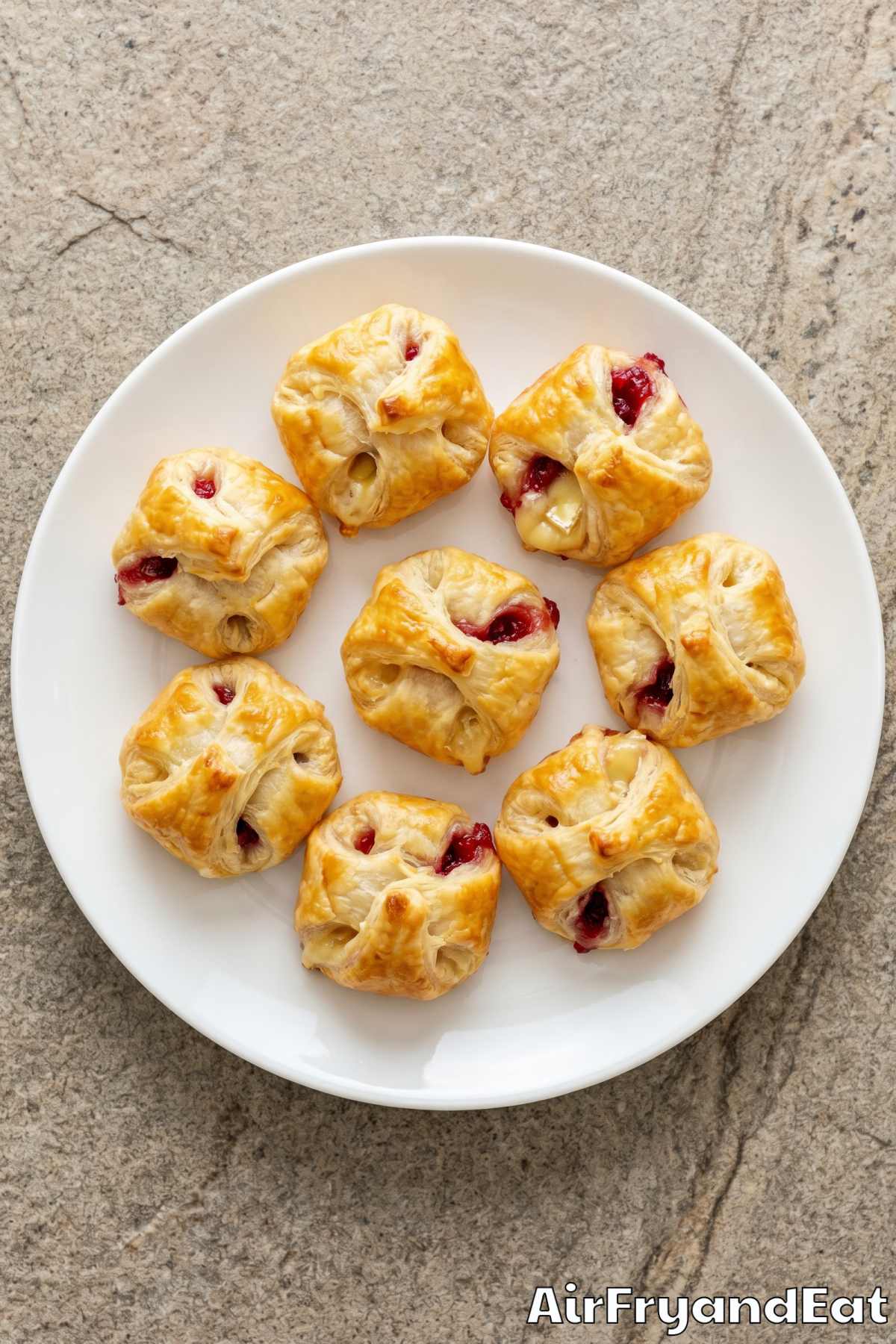 melty brie cranberry puff pastry bites