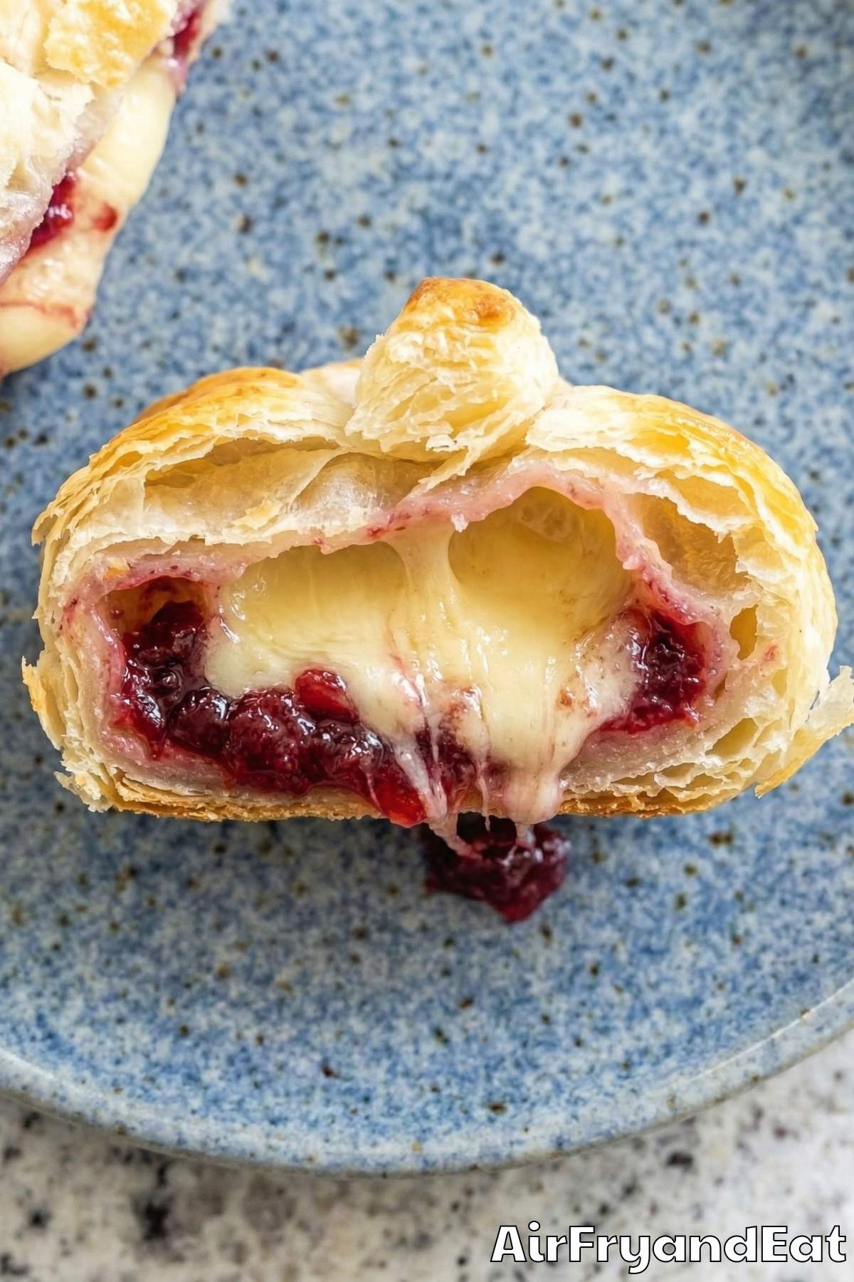 Air fryer brie & cranberry pastry bites served