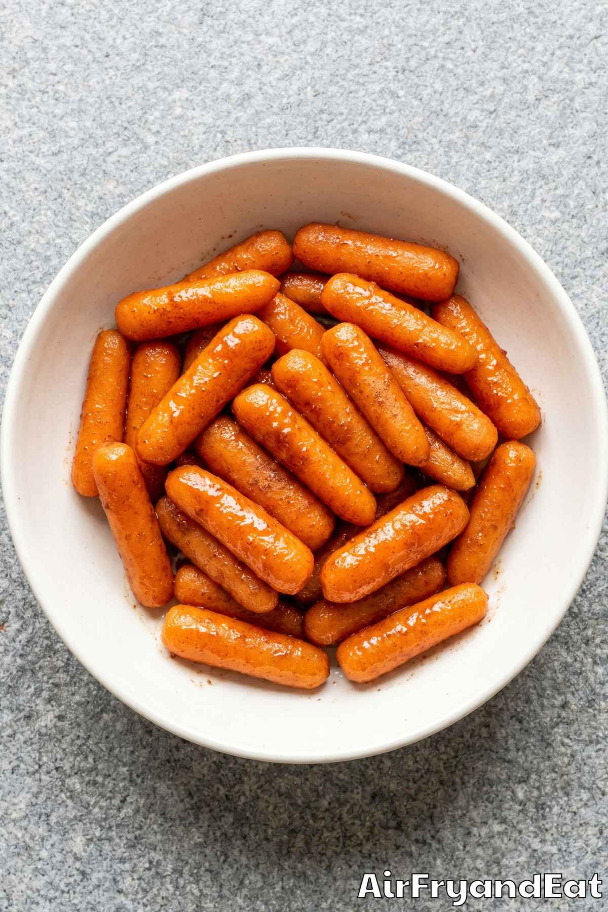glazed carrots in an air fryer basket