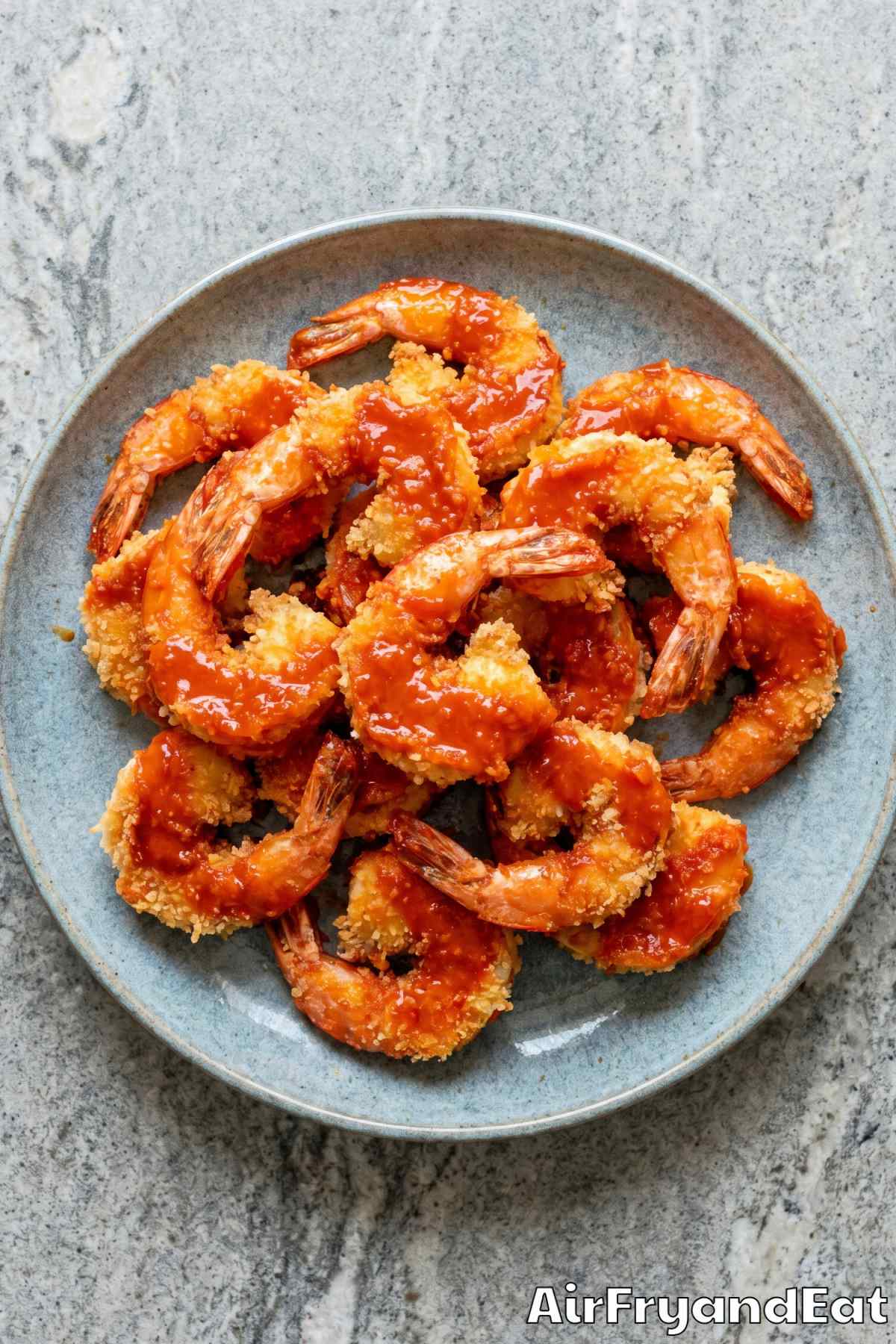 Zesty air fryer buffalo shrimp in a bowl