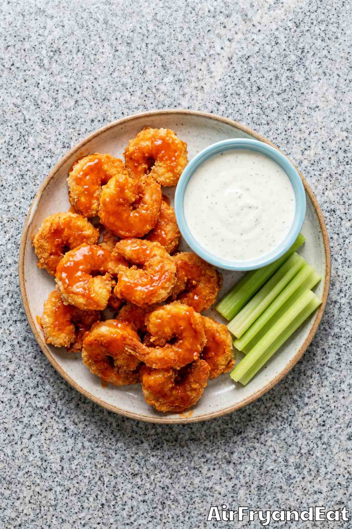 Golden air fryer buffalo shrimp served fresh