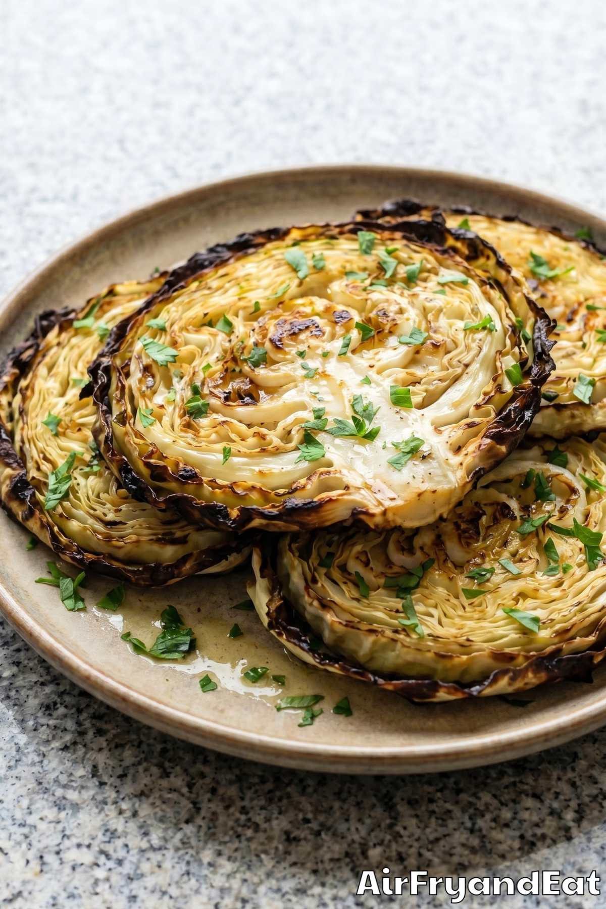 Tender air fryer cabbage steaks seasoned well