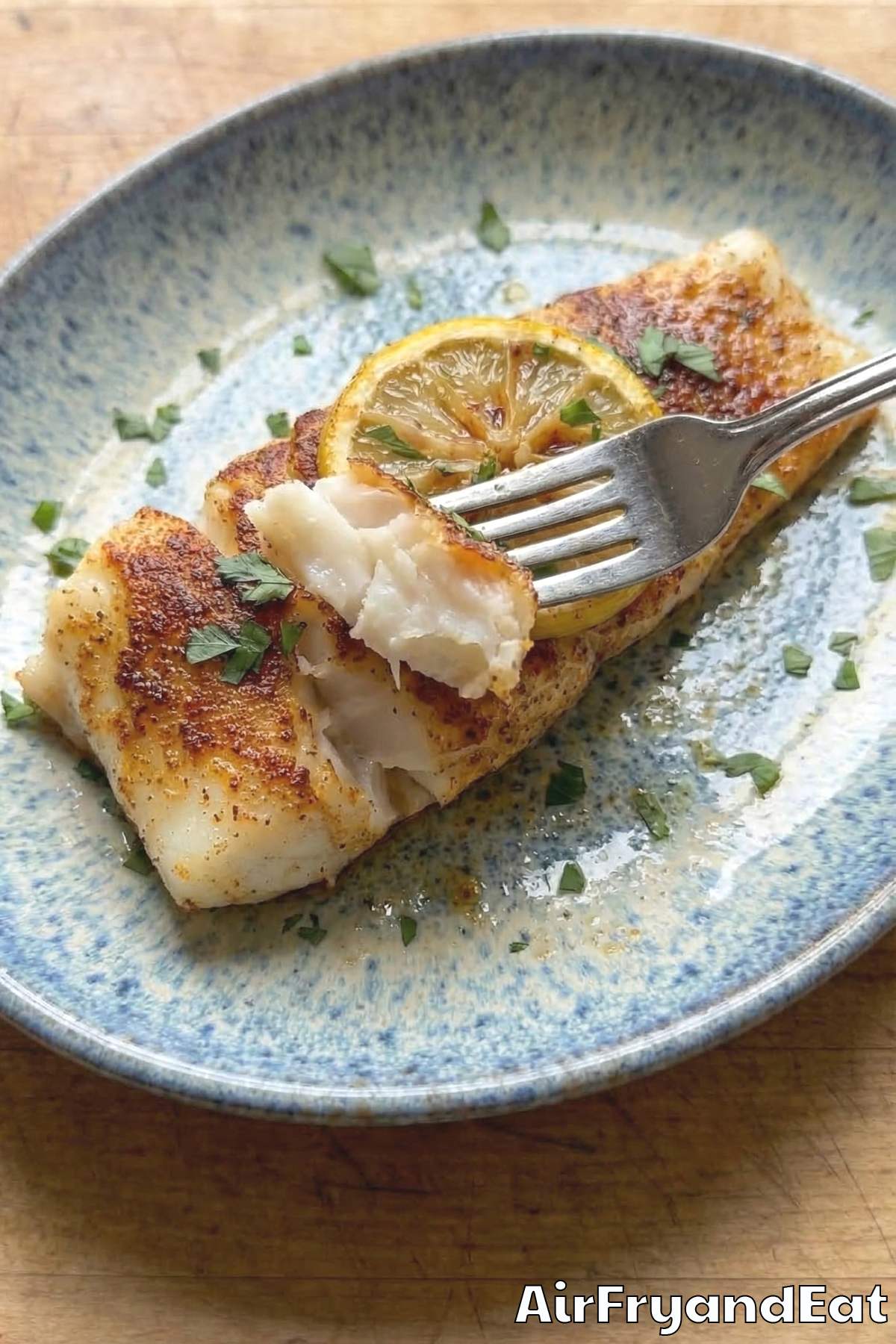 Tender air fryer Cajun cod fillets ready to eat