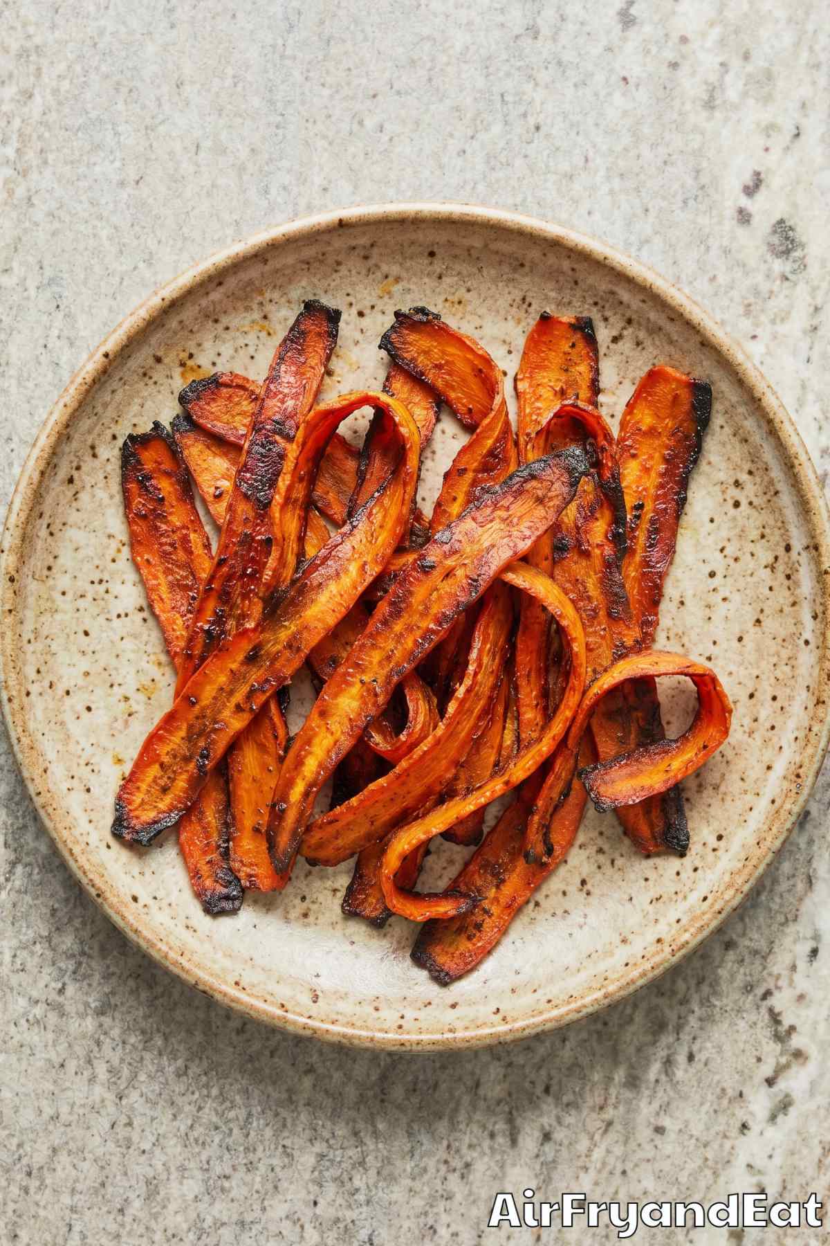 Smoky air fryer carrot bacon close-up