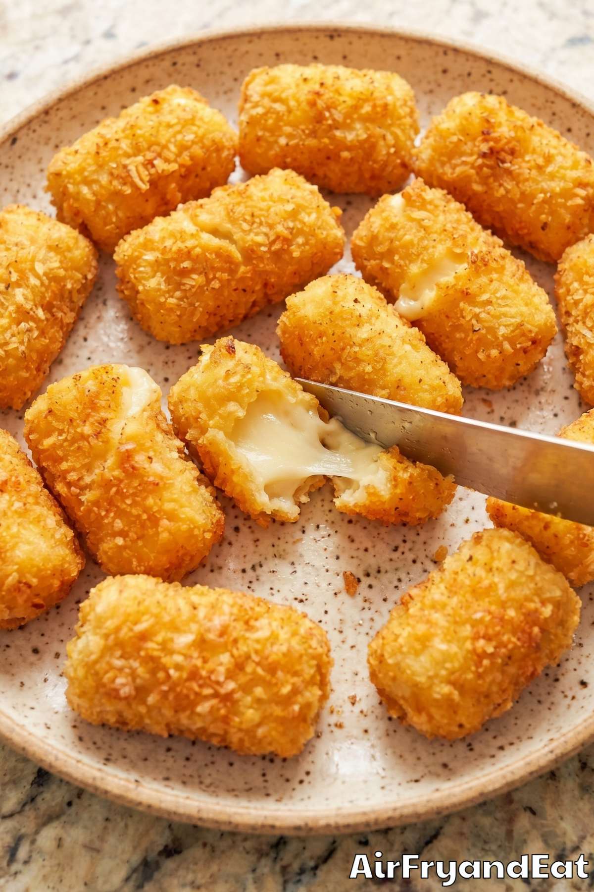 Golden air fryer cheese curds close up