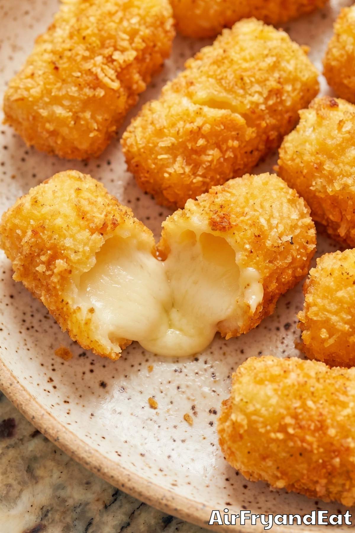 Irresistible air fryer cheese curds served