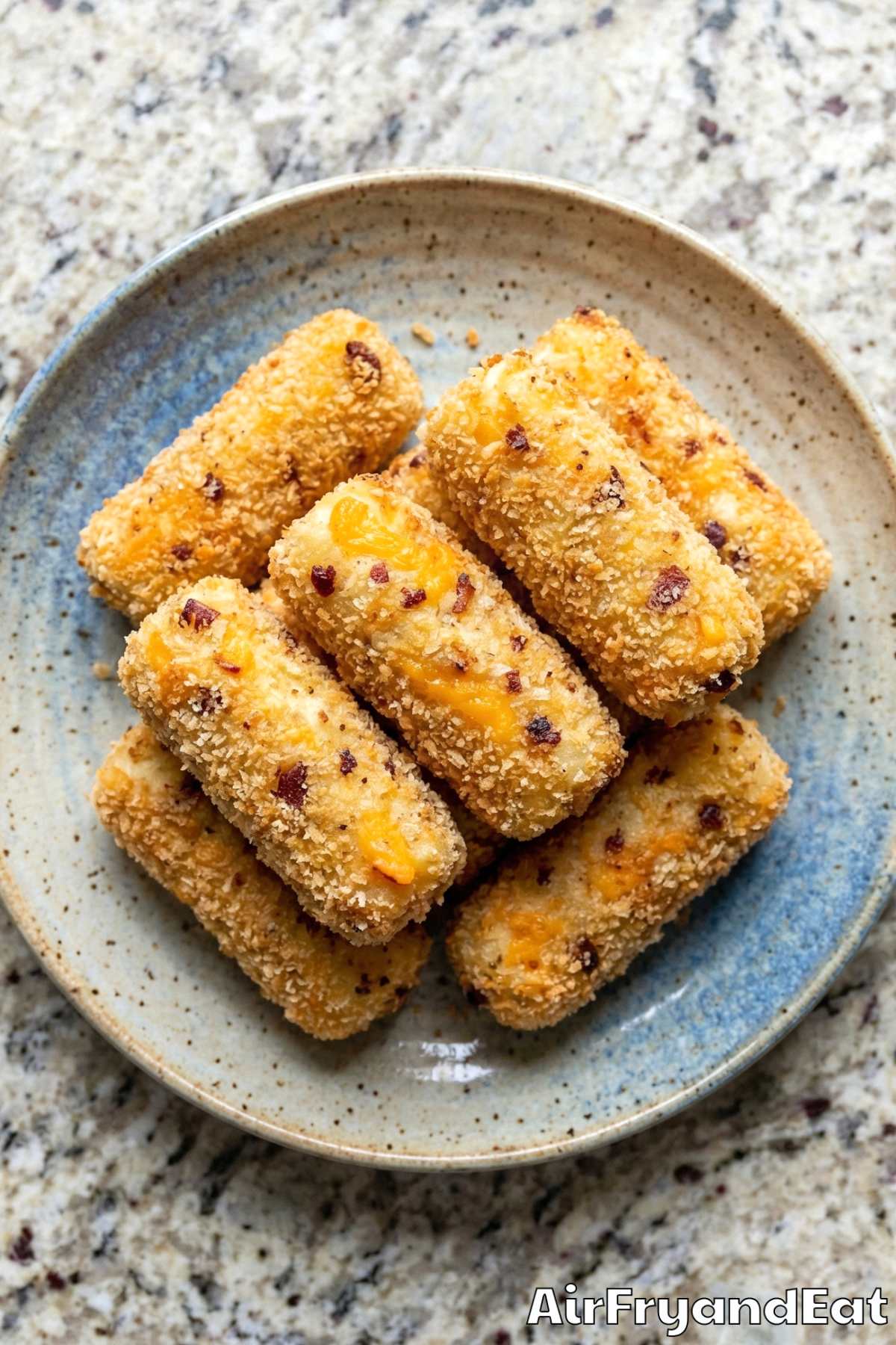 Hearty cheesy bacon potato croquettes stacked up