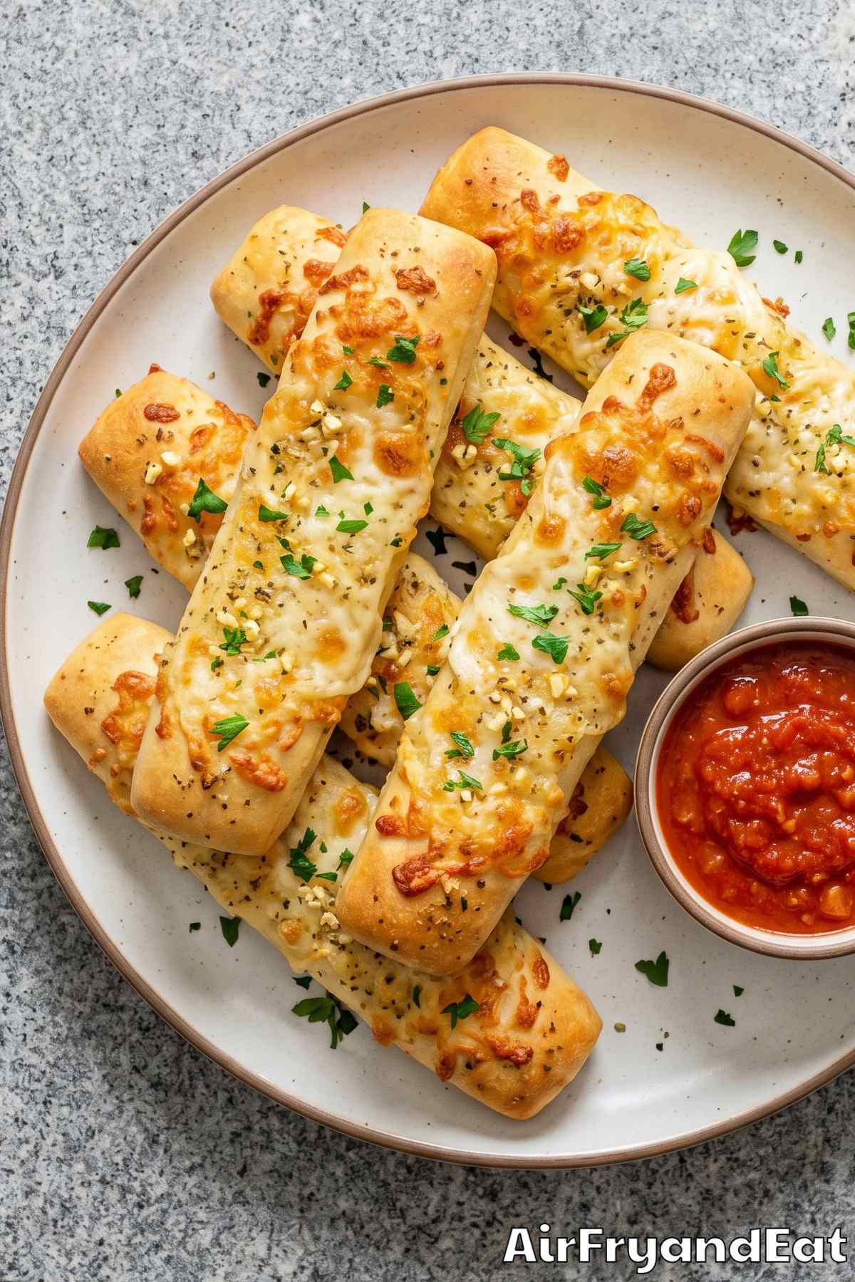 golden cheesy garlic breadsticks from air fryer
