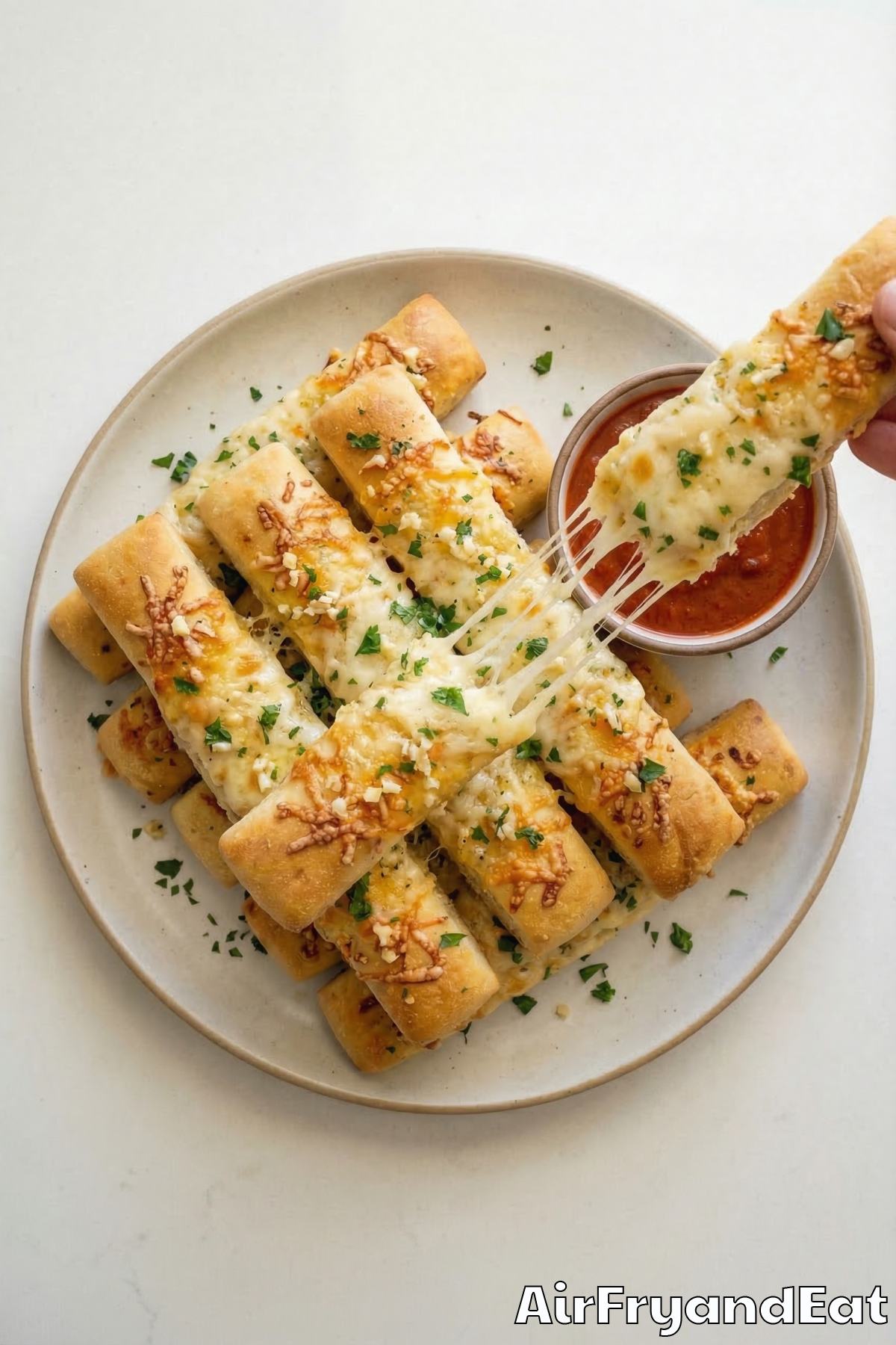 Irresistible air fryer cheesy garlic breadsticks