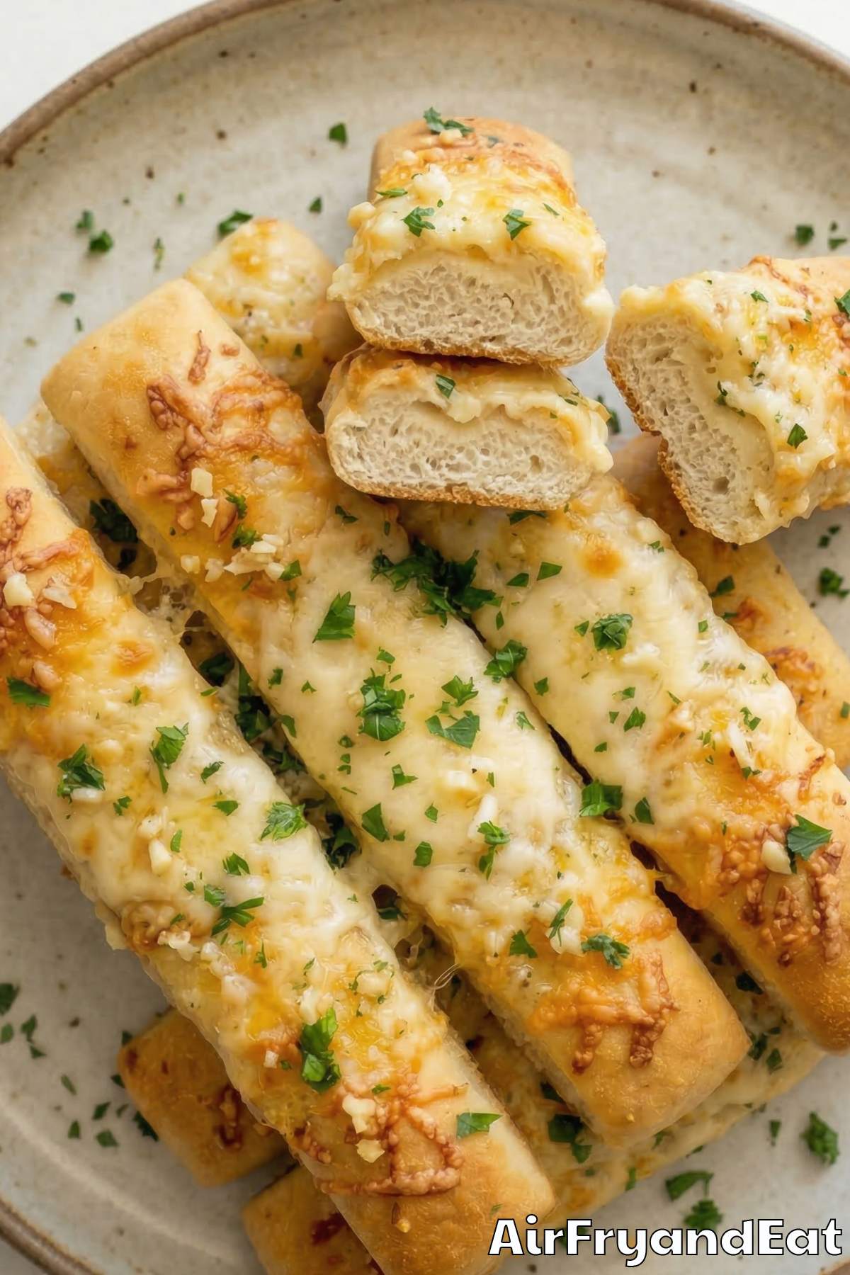 Buttery air fryer cheesy garlic breadsticks