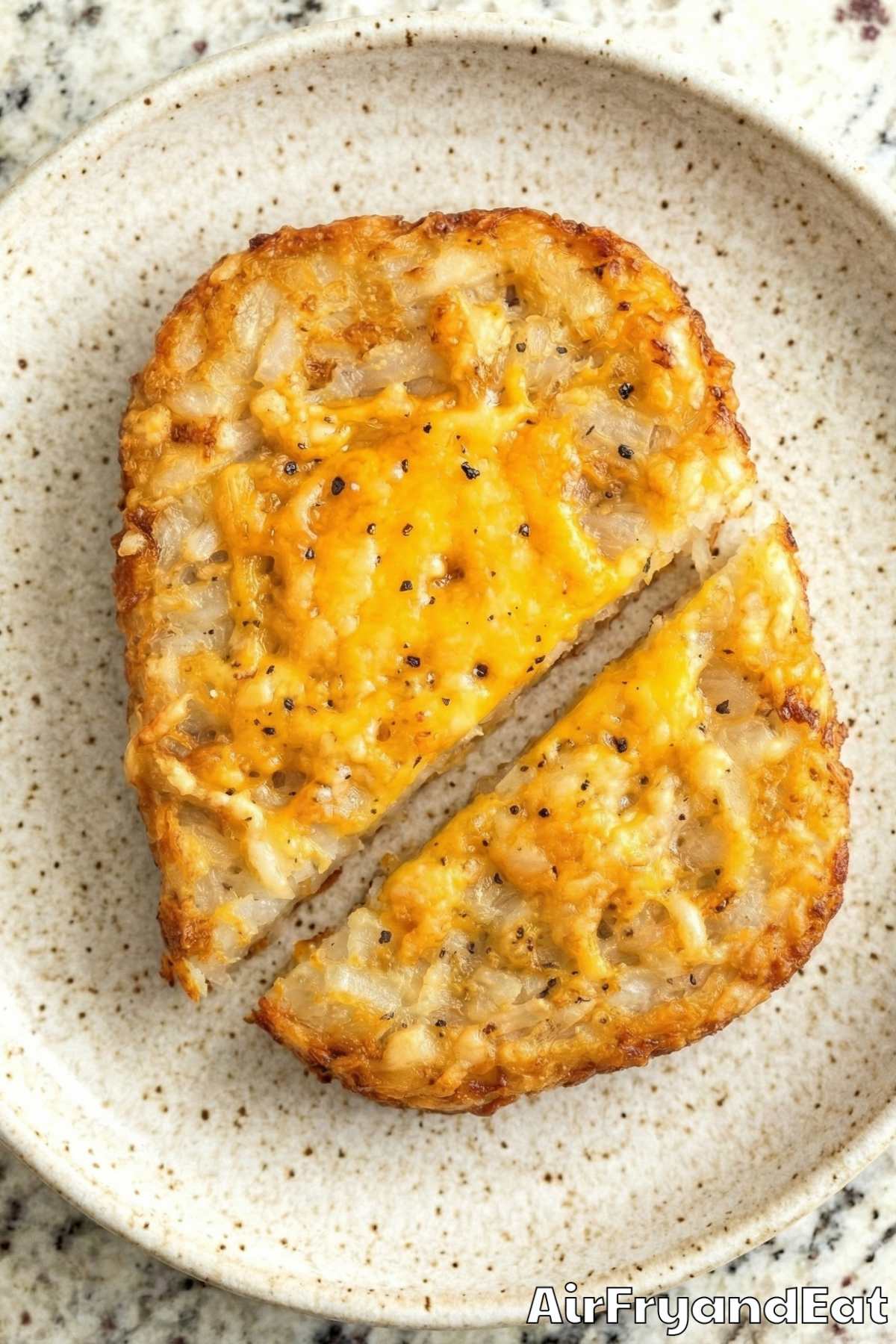 Warm cheesy hash brown patties from air fryer