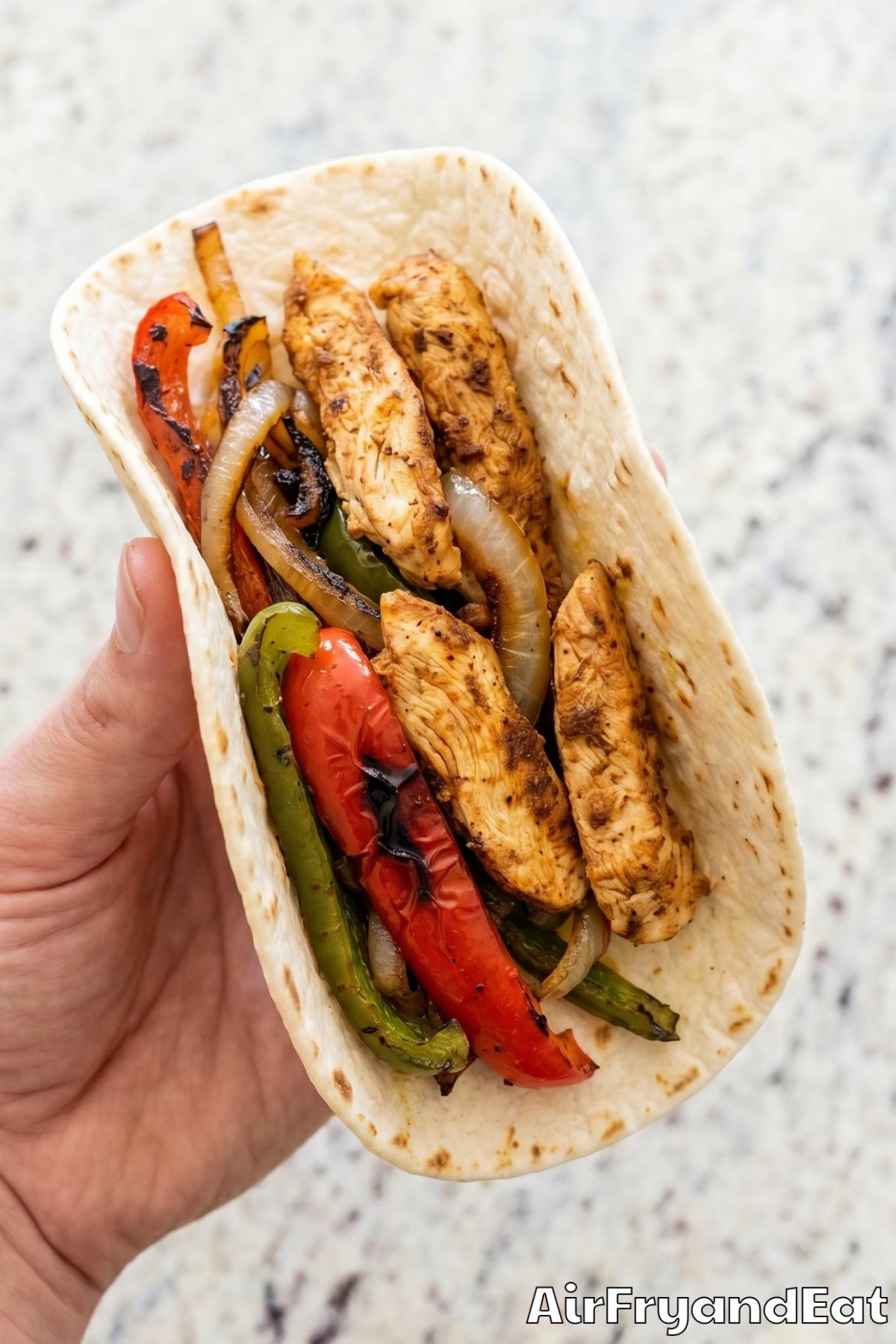 Juicy air fryer chicken fajitas served