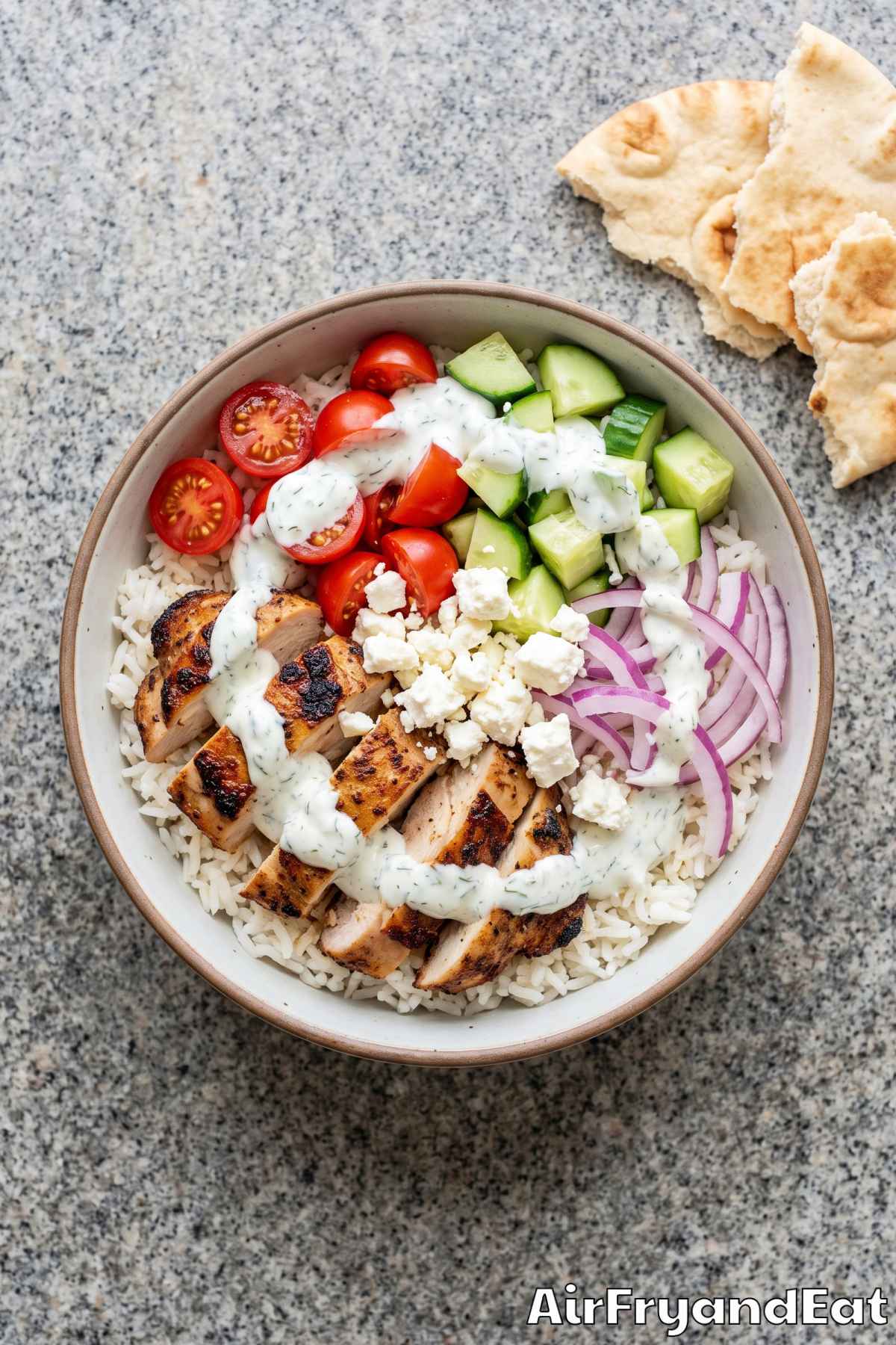Savory chicken gyro bowl with cucumber