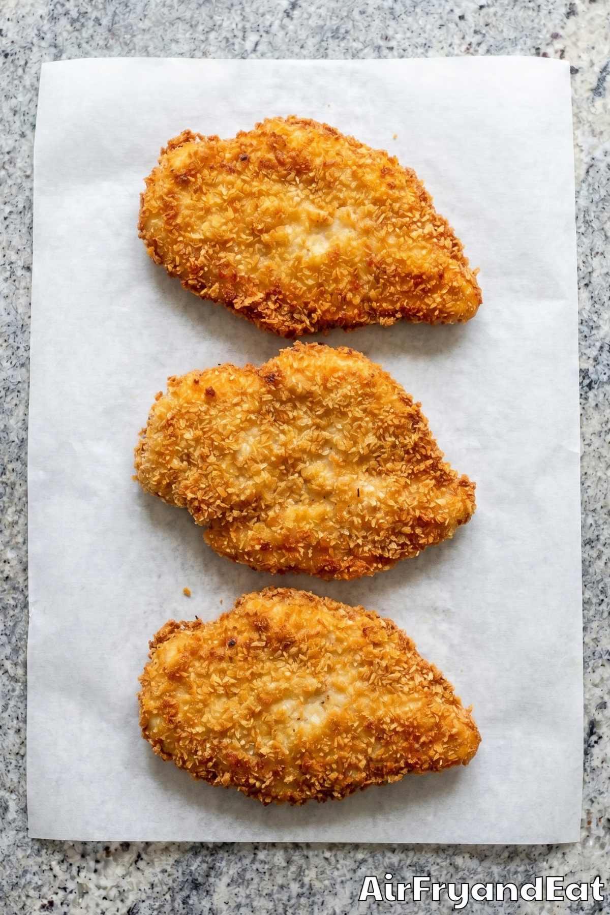Crunchy air fryer chicken schnitzel plated