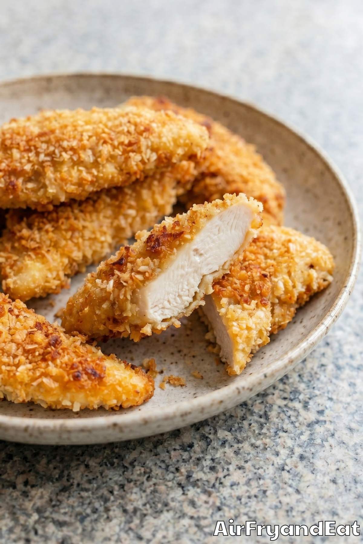 crispy air fryer chicken tenders on a plate
