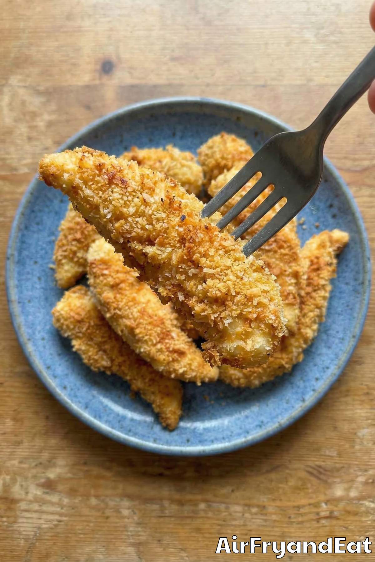 Savory air fryer chicken tenders piled high