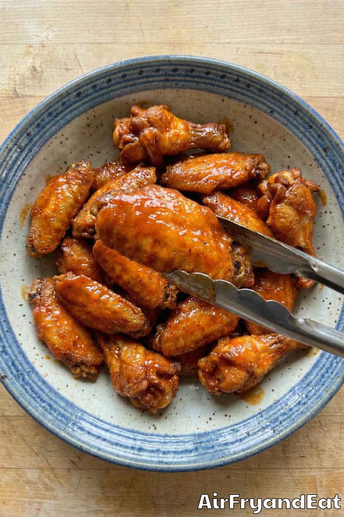 Irresistible air fryer chicken wings stacked up
