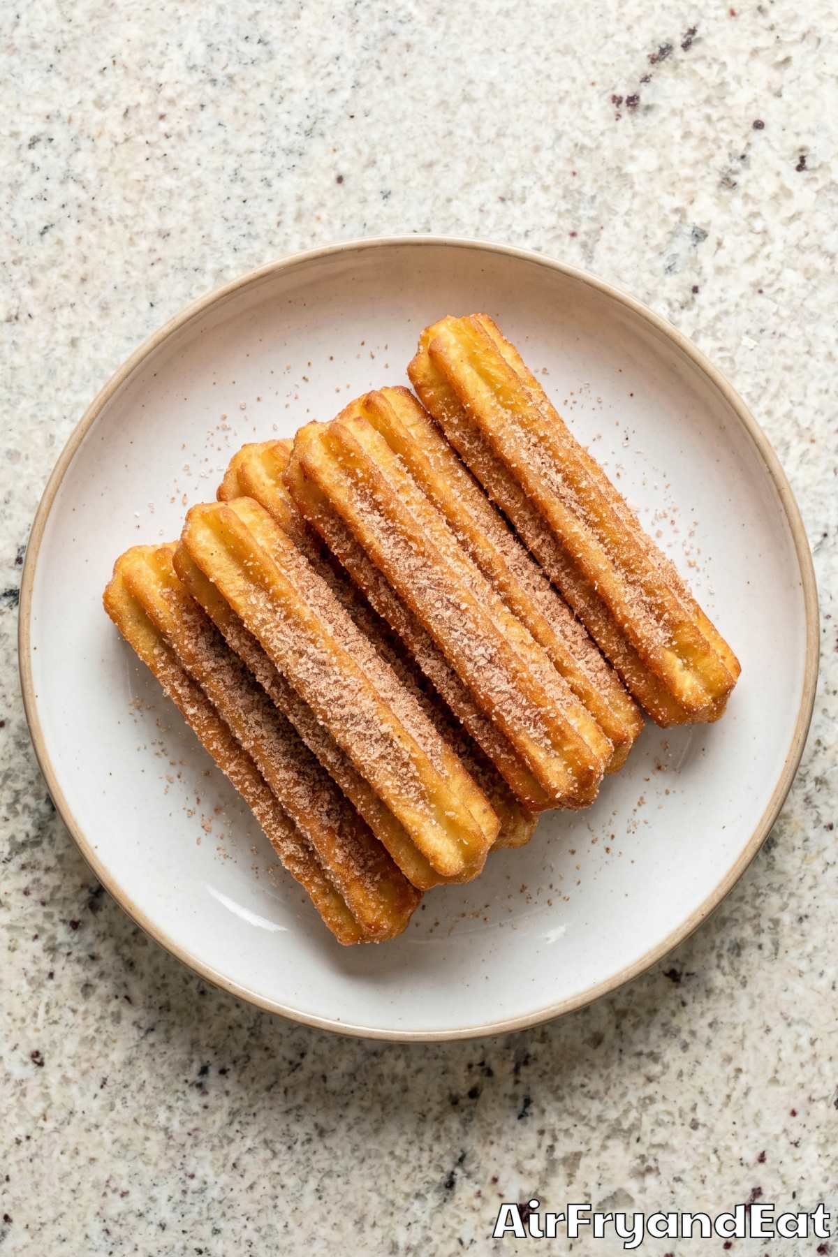 crispy air fryer churros with cinnamon sugar