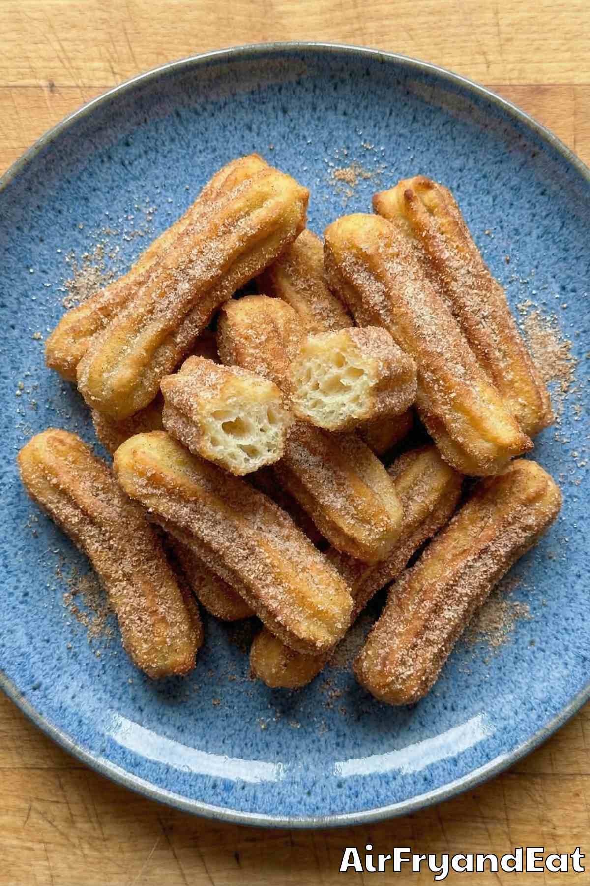 Easy air fryer churros coated in sugar