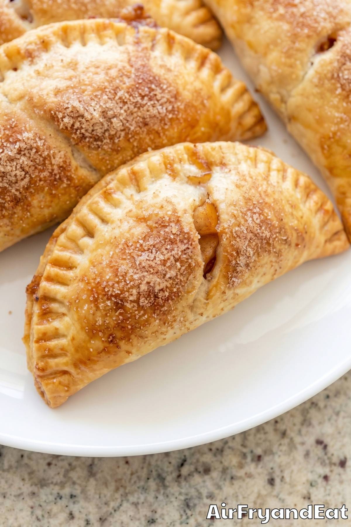 flaky air fryer apple cinnamon empanadas