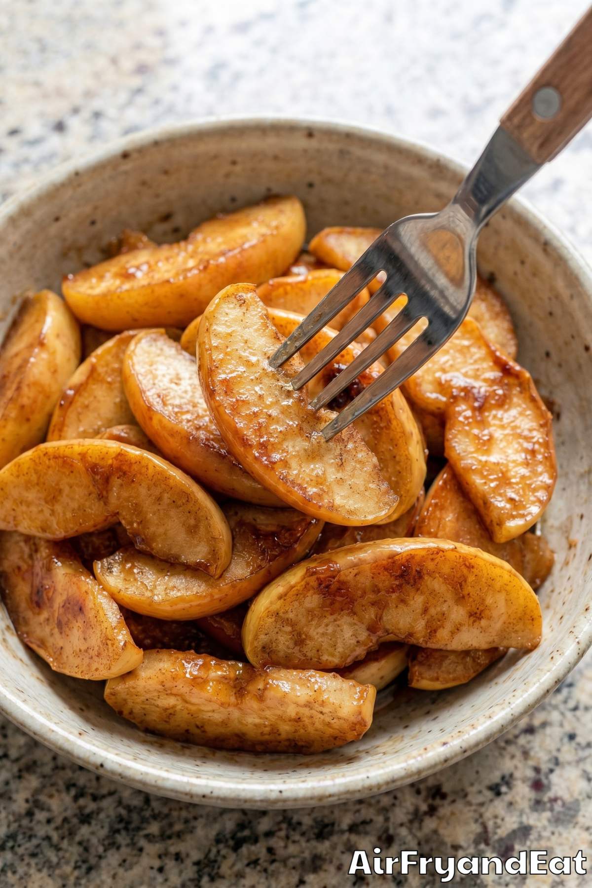 Sweet air fryer cinnamon apples on a plate