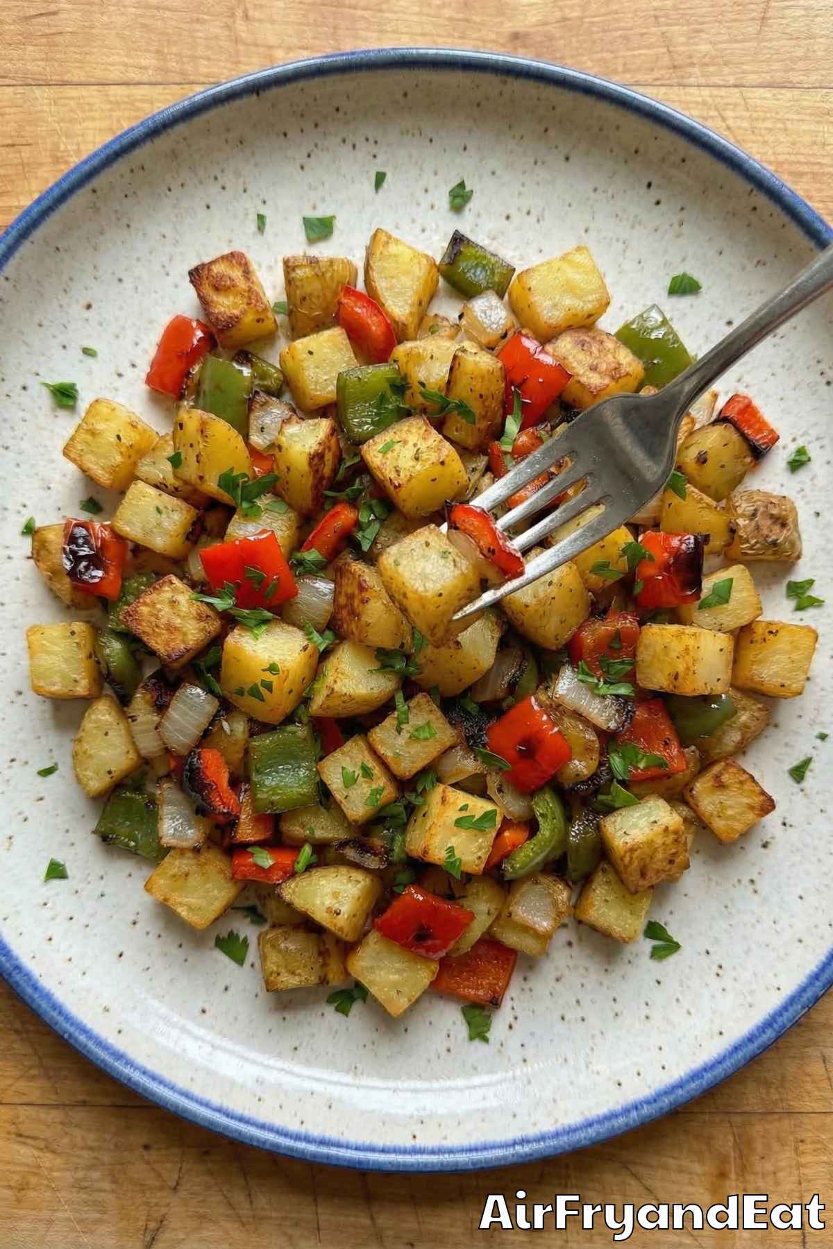 Crunchy air fryer breakfast potatoes and peppers