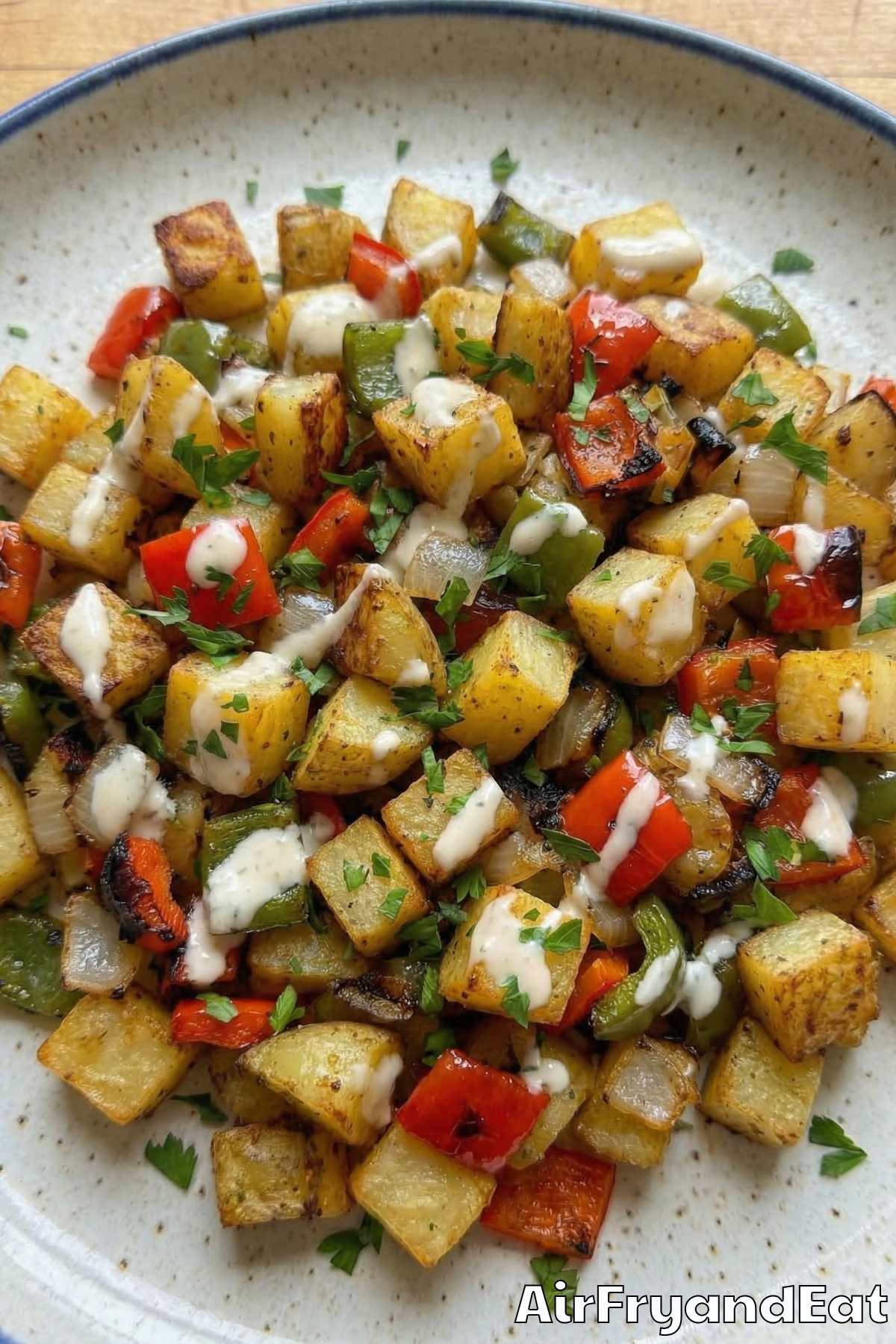 Perfect air fryer breakfast potatoes with peppers