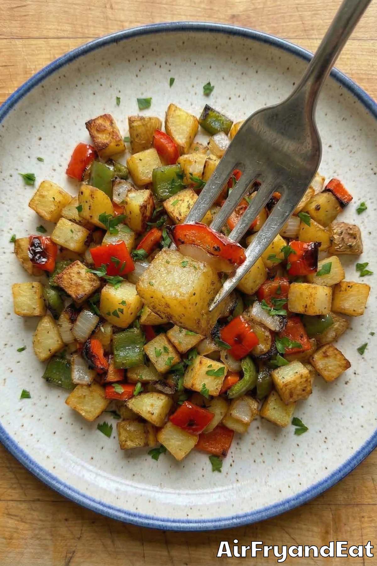Warm air fryer breakfast potatoes and peppers