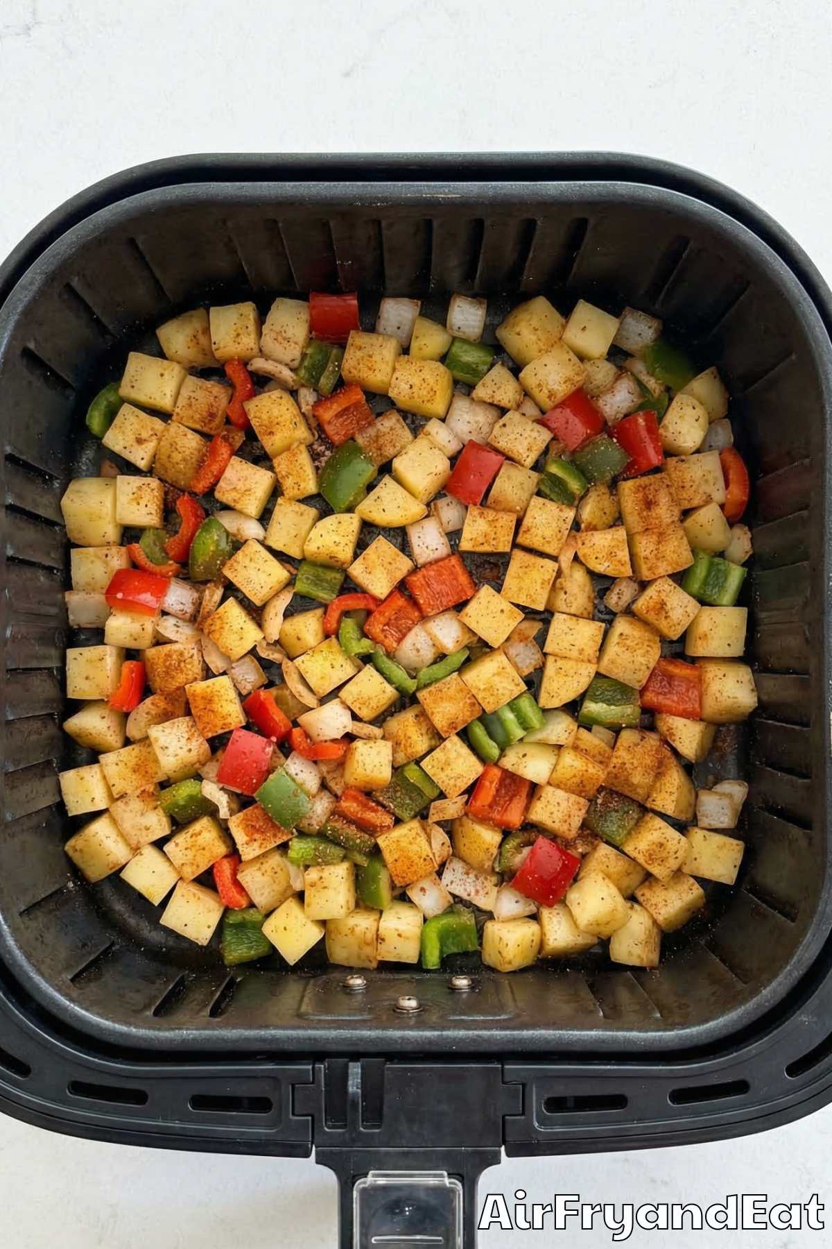 Air Fryer Crispy Breakfast Potatoes with Peppers Step 3