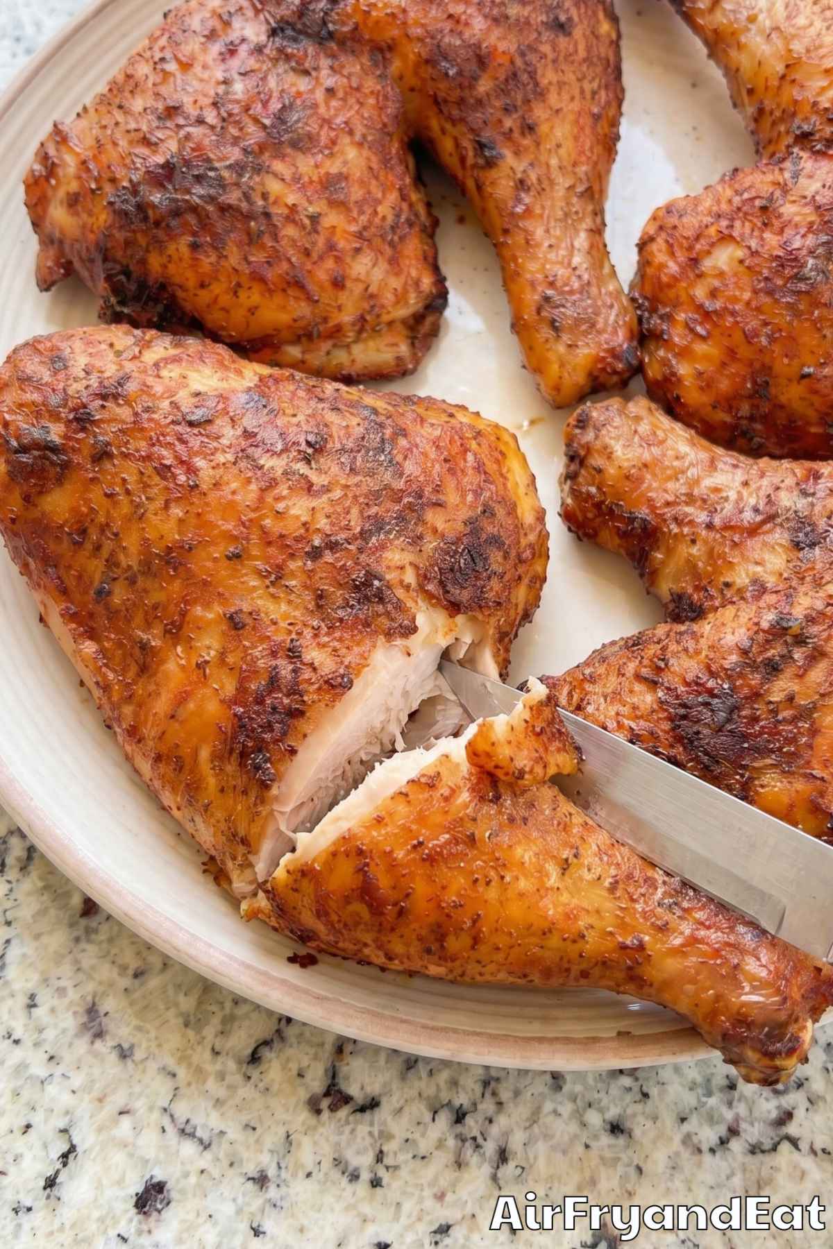 Golden air fryer chicken leg quarters close-up