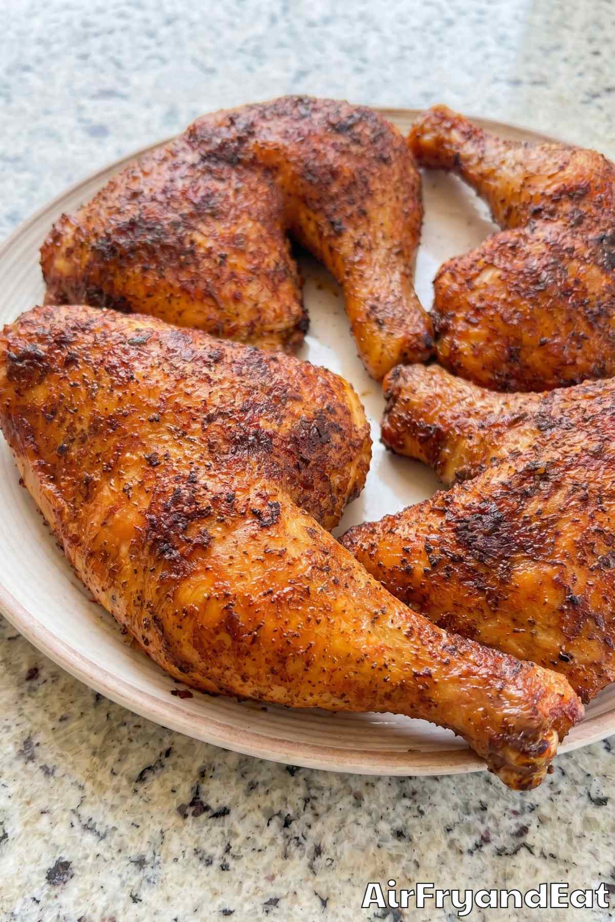 Savory air fryer chicken leg quarters plated