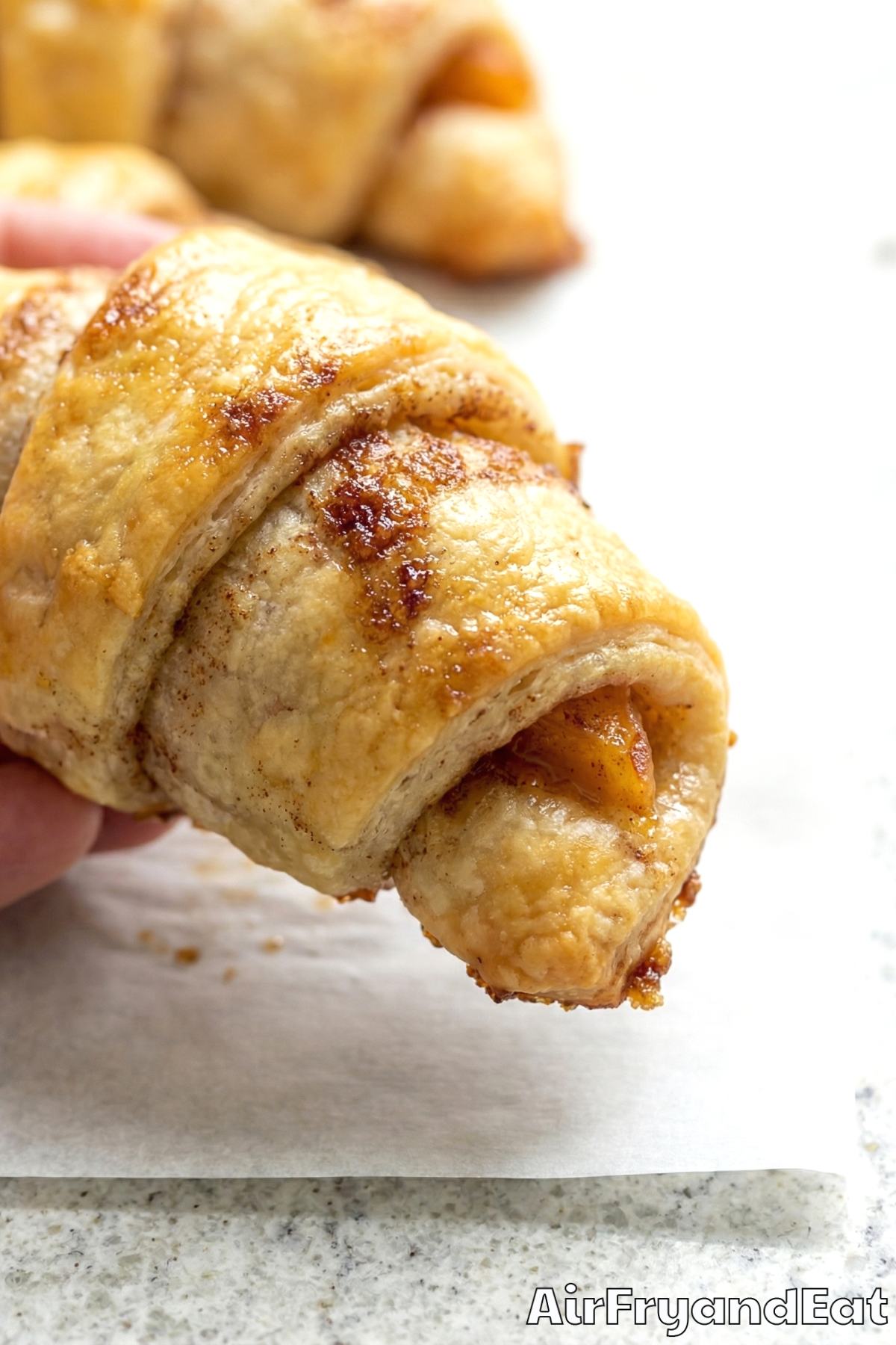 Irresistible air fryer peach cobbler rolls