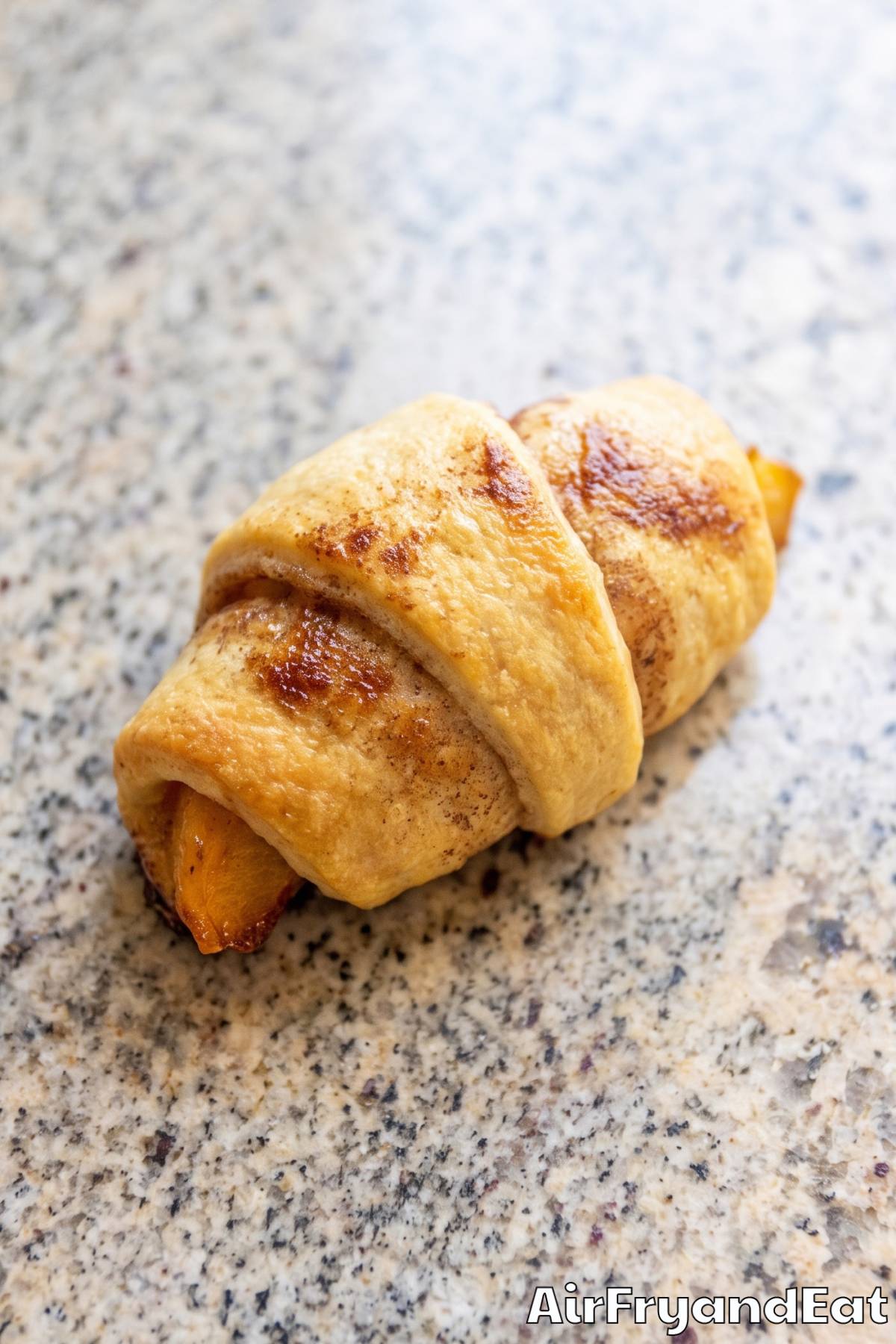 Crispy air fryer peach cobbler rolls
