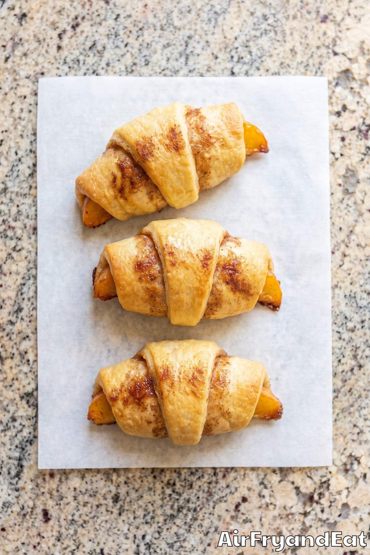 Warm peach cobbler rolls stacked