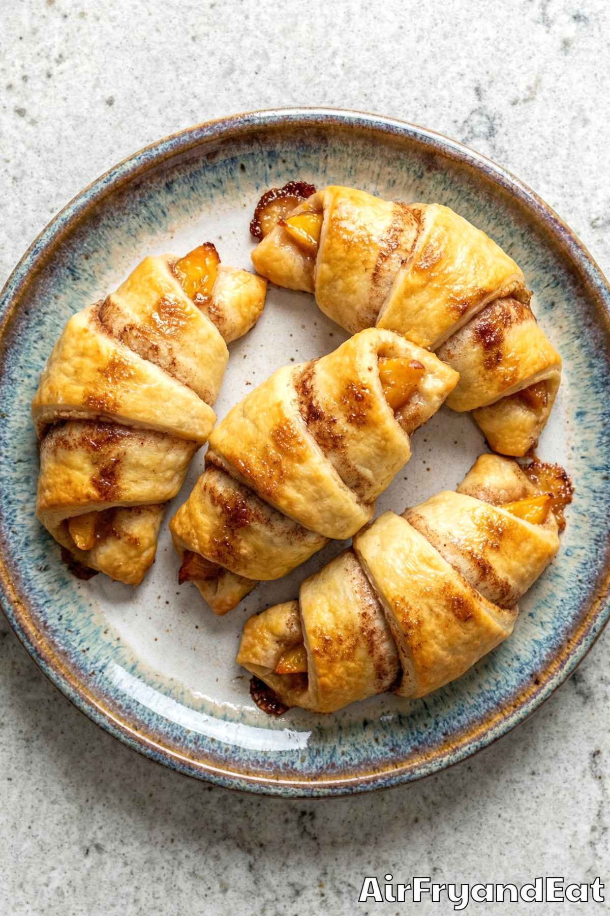 Buttery crispy peach cobbler rolls air fryer