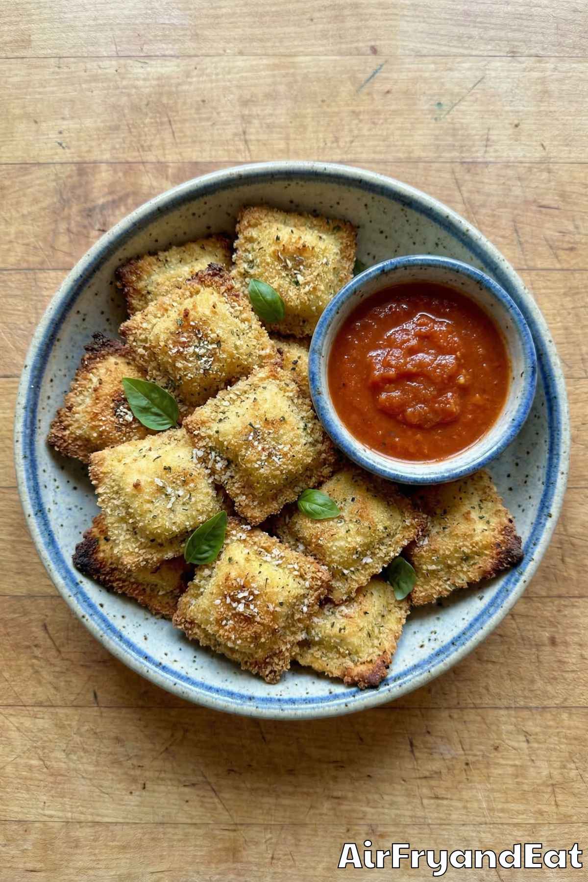 Homemade air fryer crispy ravioli marinara