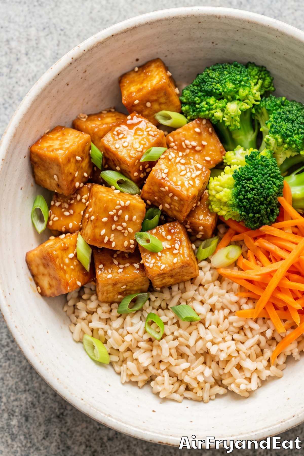 Golden air fryer sesame tofu bowl