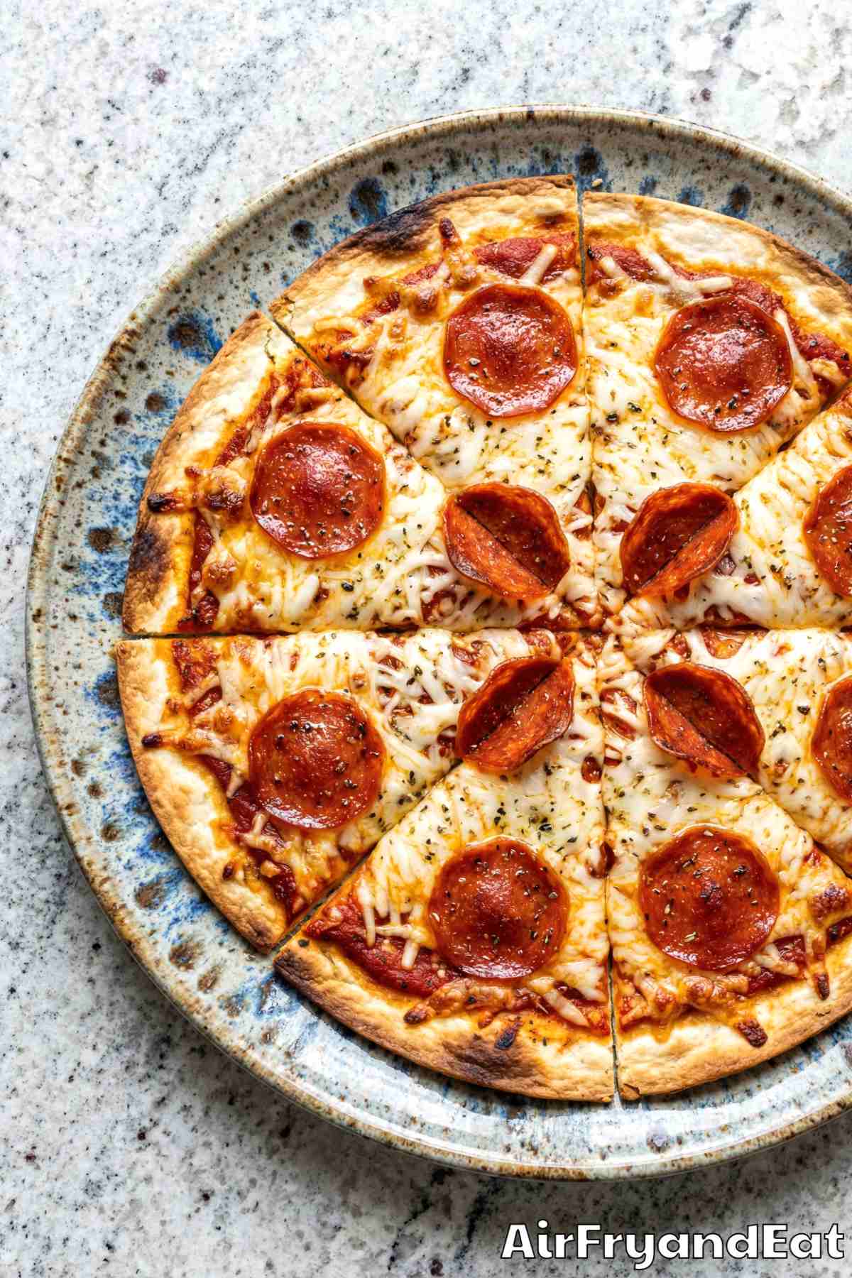 Golden air fryer crispy tortilla pizzas